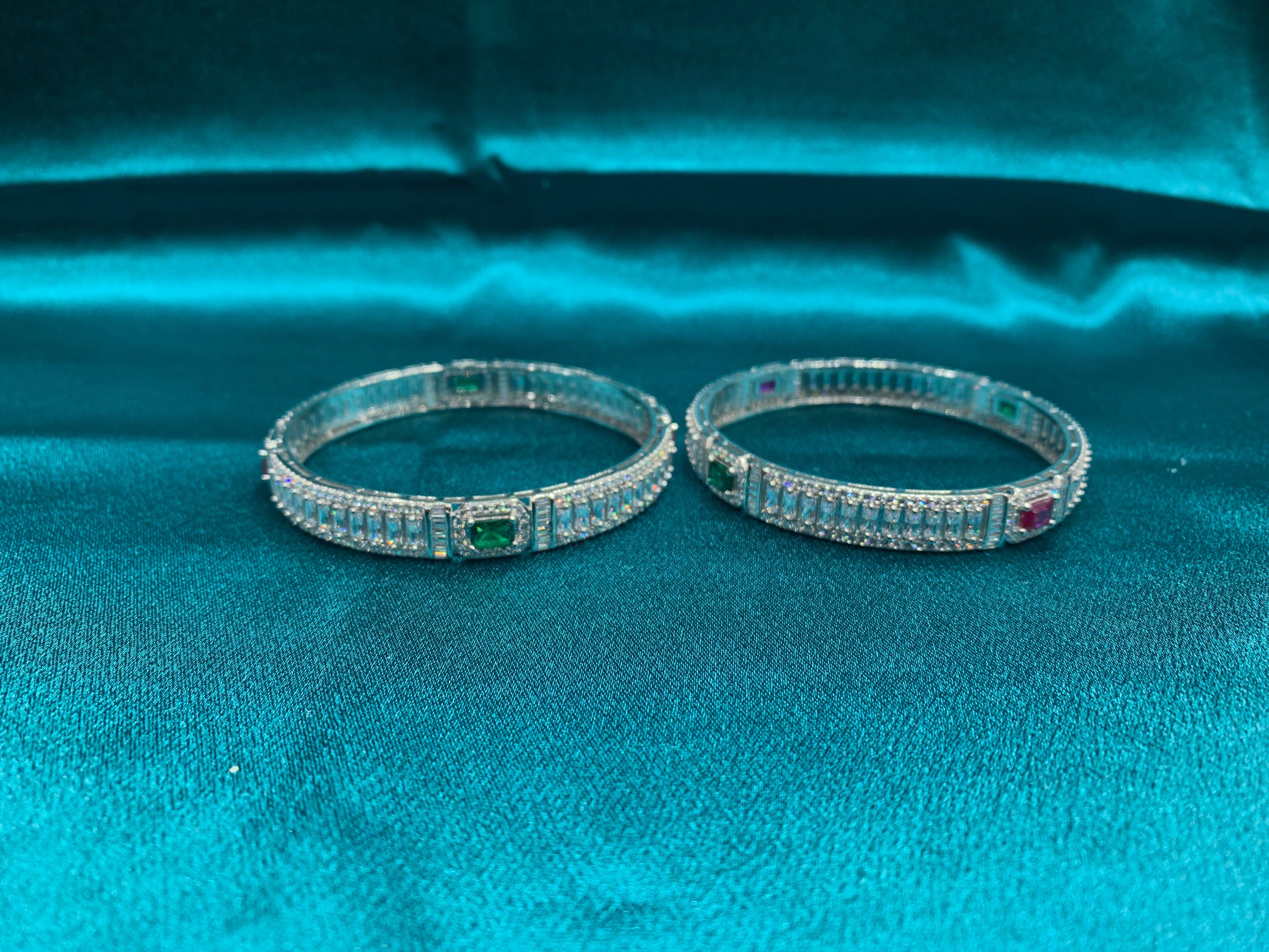 Elegant CZ diamond silver bangles with pink and green sqare cut stones