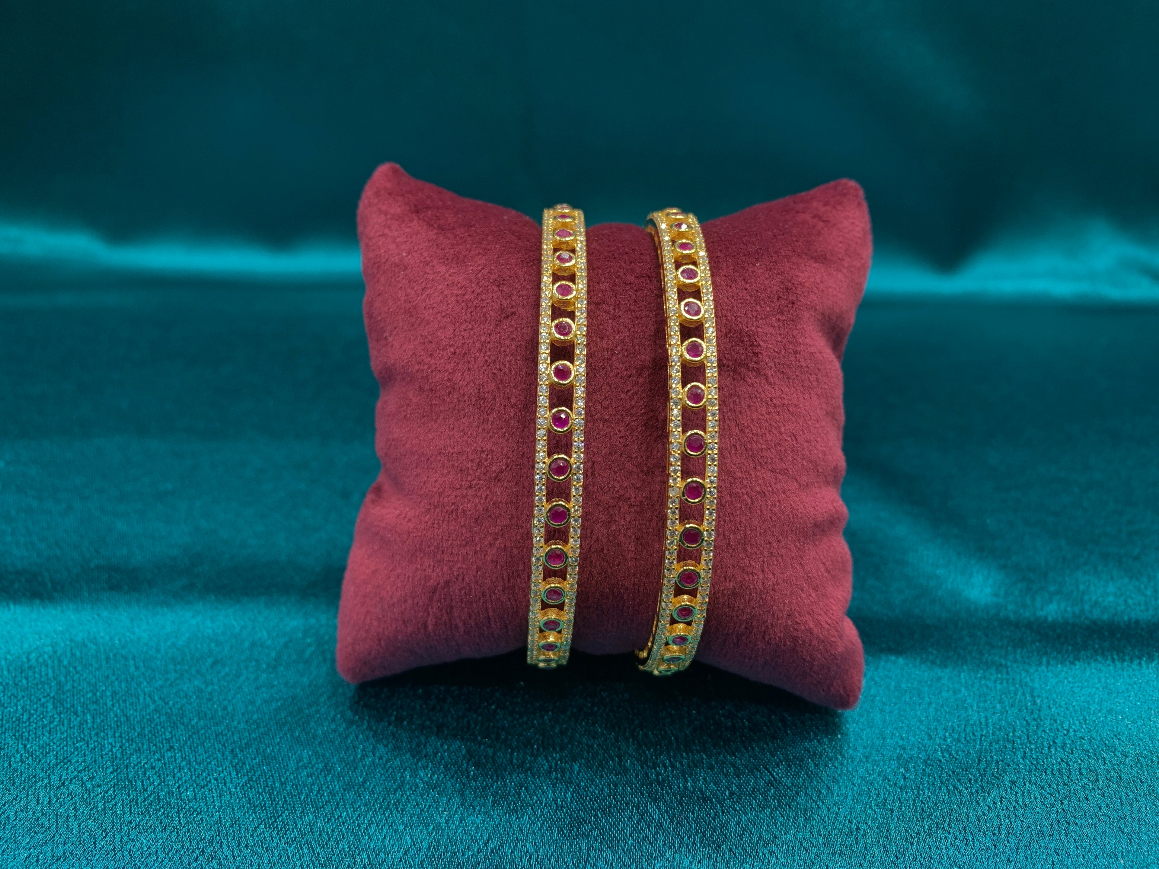Dazzling gold plated silver bangles with pink CZ diamonds
