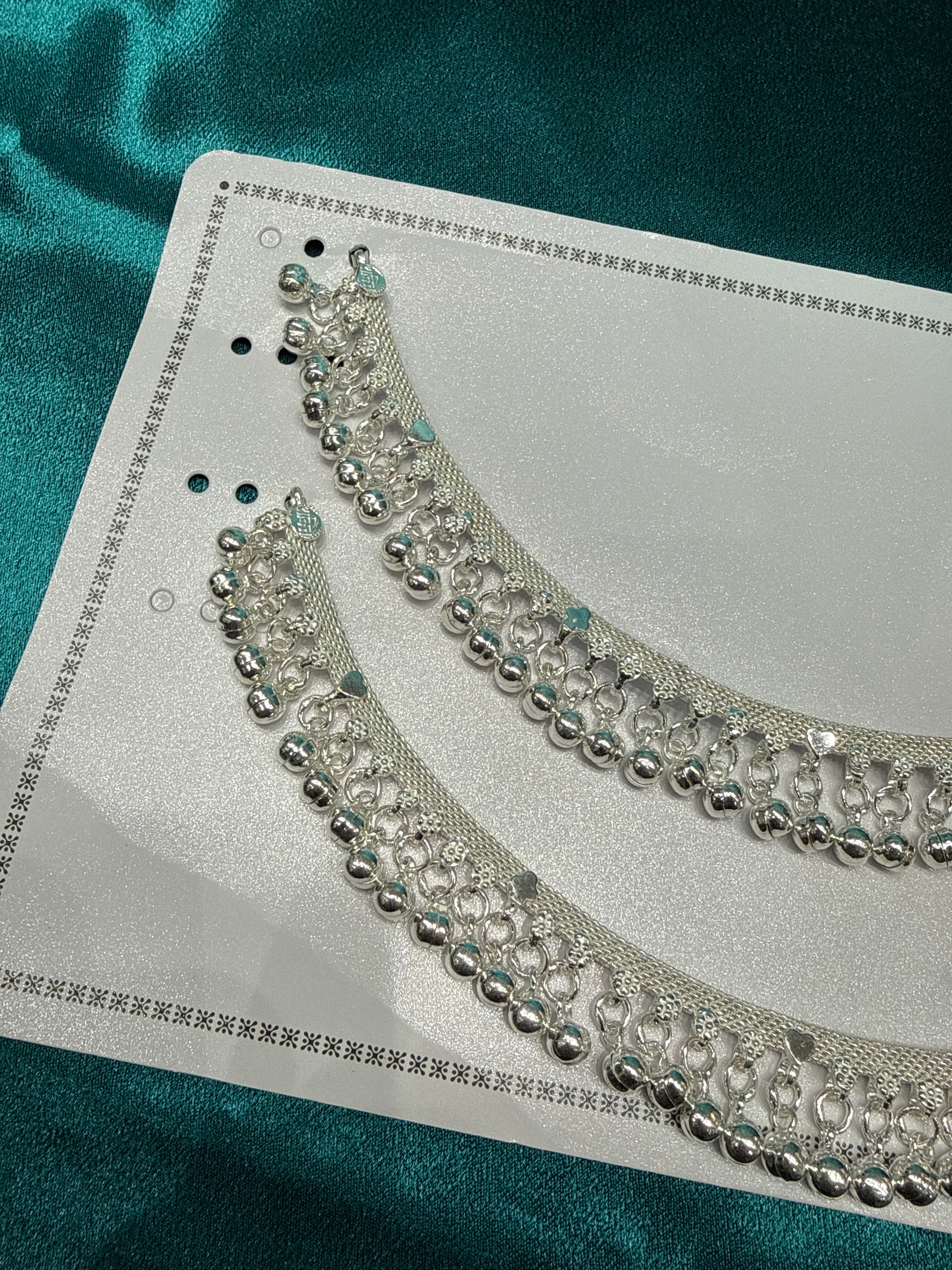 Traditional heavy silver anklet with bells hanging