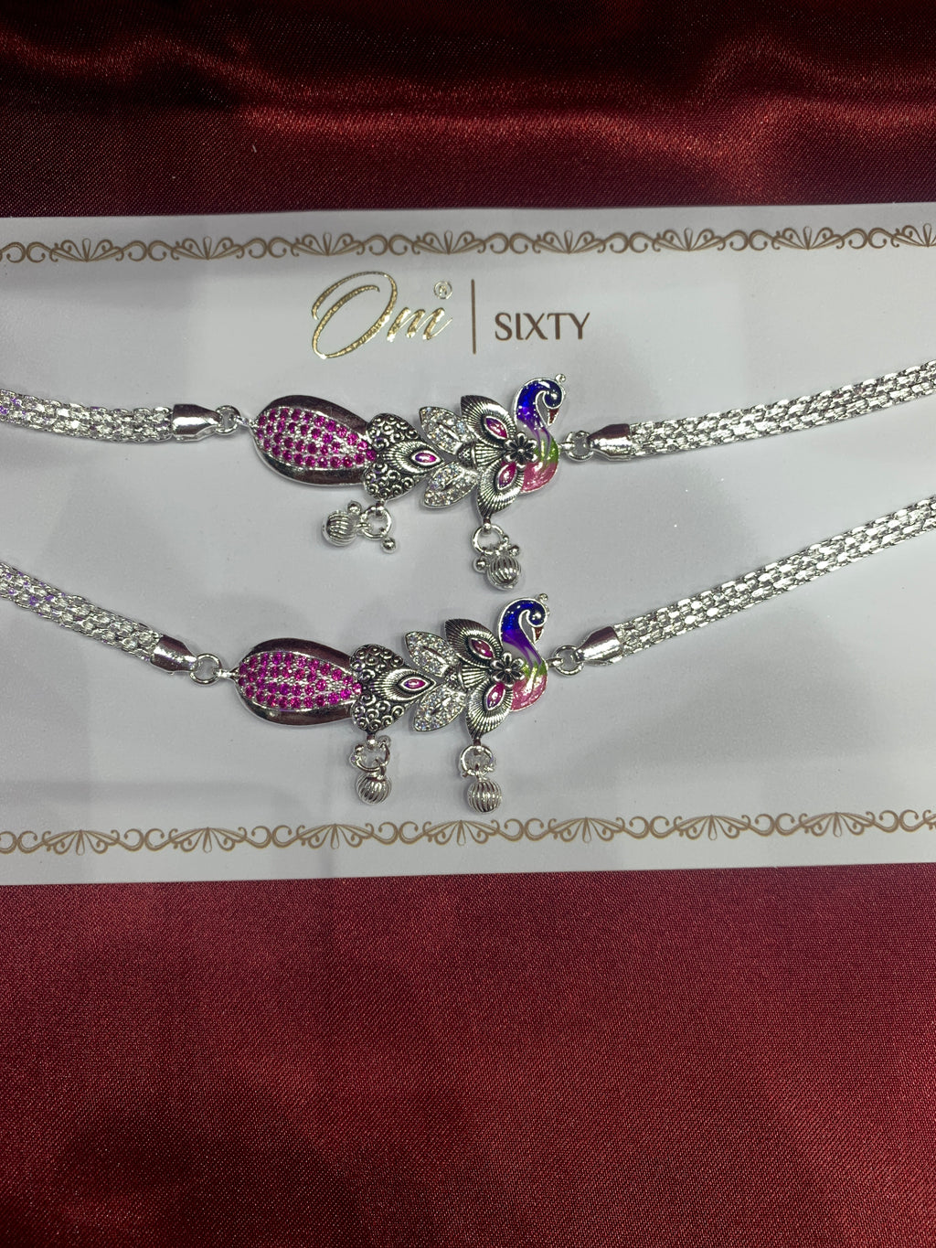 Fancy silver anklets with peacock design