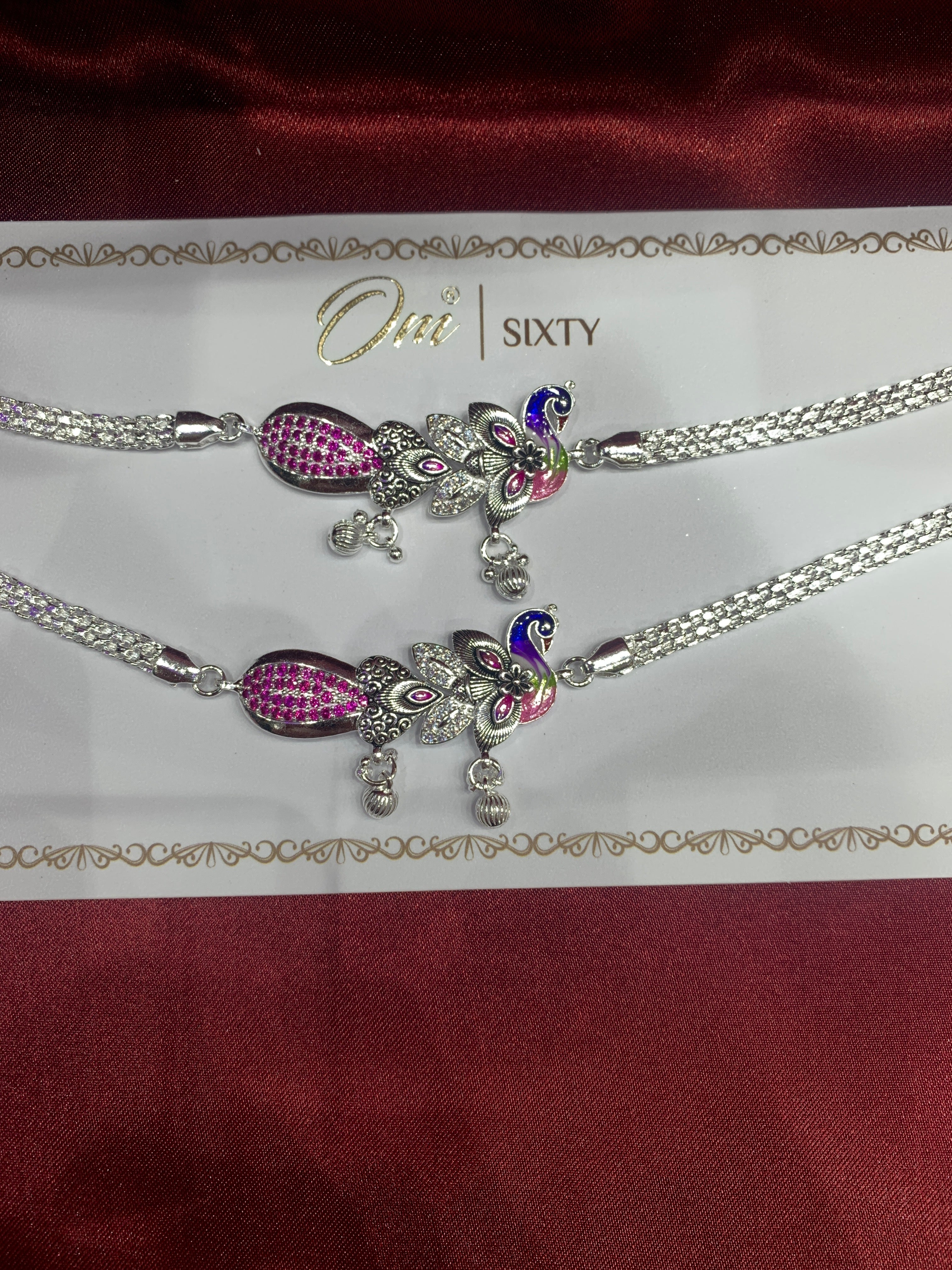Fancy silver anklets with peacock design