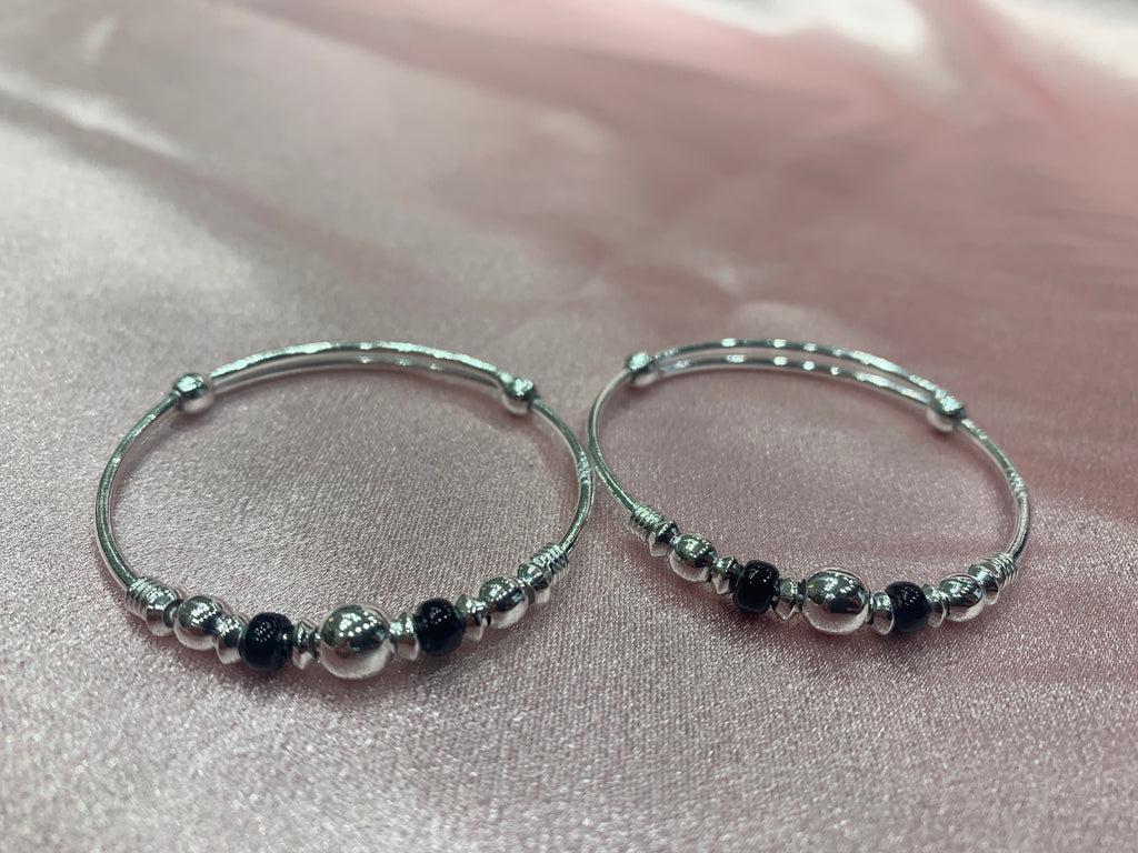 Silver baby bangles with black and silver beads