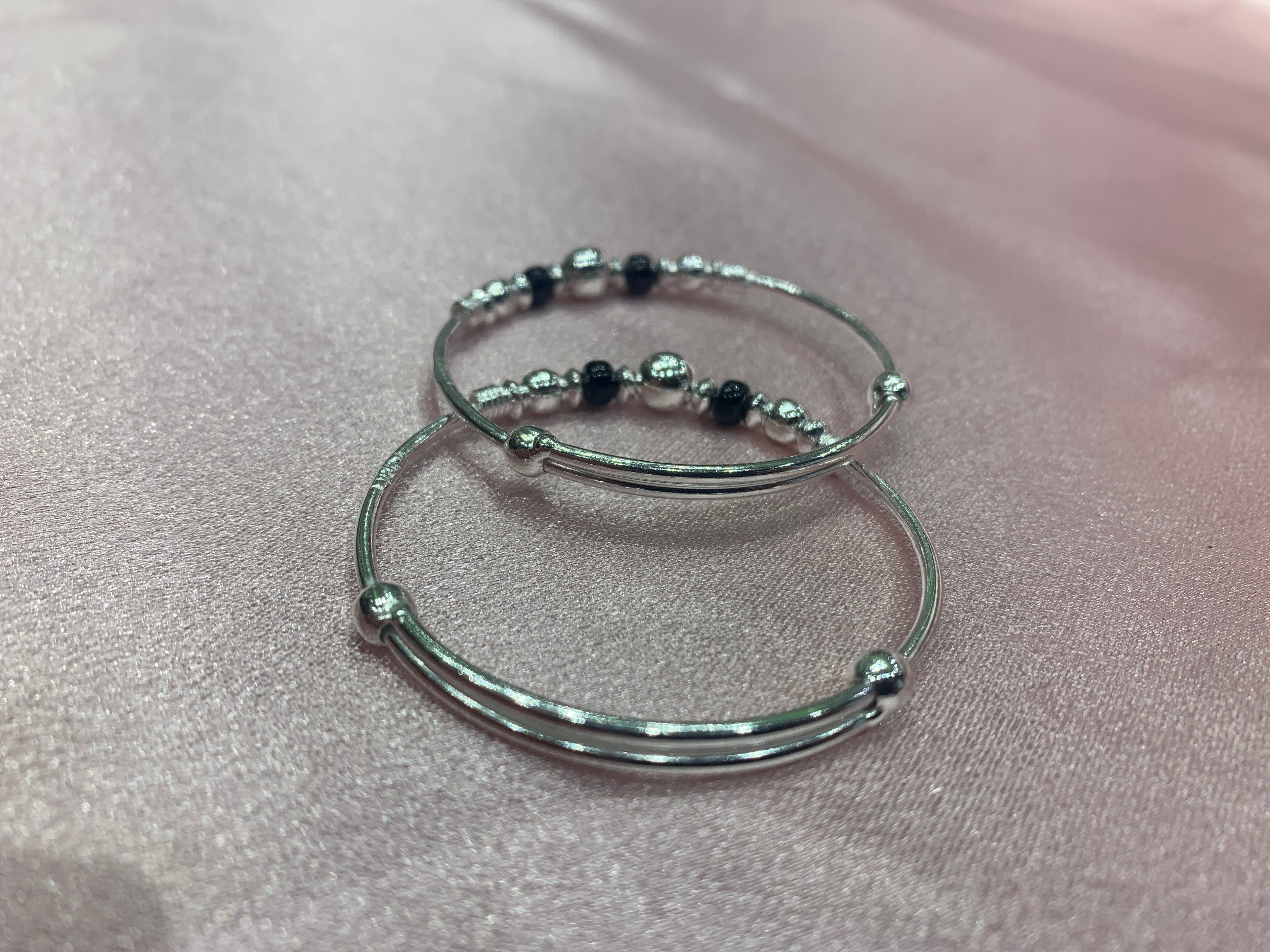 Silver baby bangles with black and silver beads