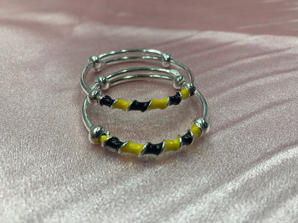 Silver baby bangles in black and yellow colour