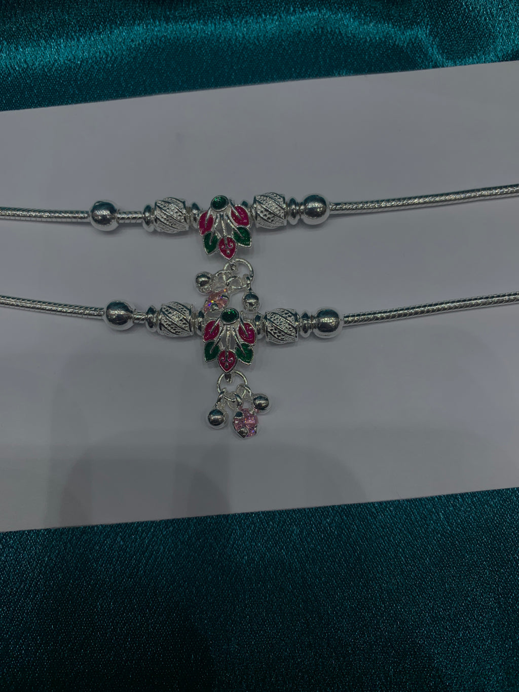 Fancy silver anklets with flower petals design