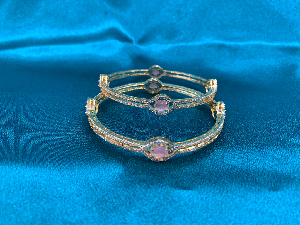 Dazzling gold plated silver bangles with peach oval cutting CZ diamonds