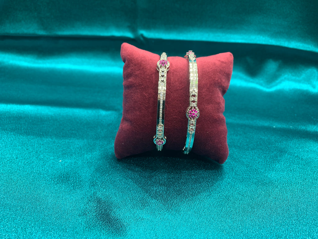 Elegant CZ diamond silver bangles with pink stones in flower pattern