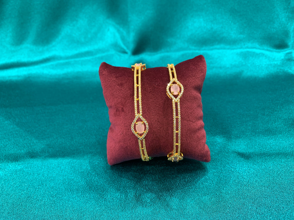 Dazzling gold plated silver bangles with peach oval cutting CZ diamonds