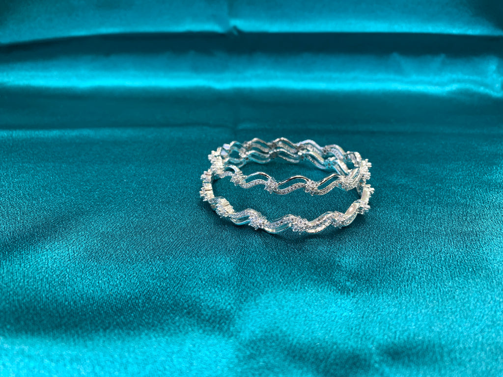 Elegant CZ diamond silver bangles with wavy design and white CZ diamonds