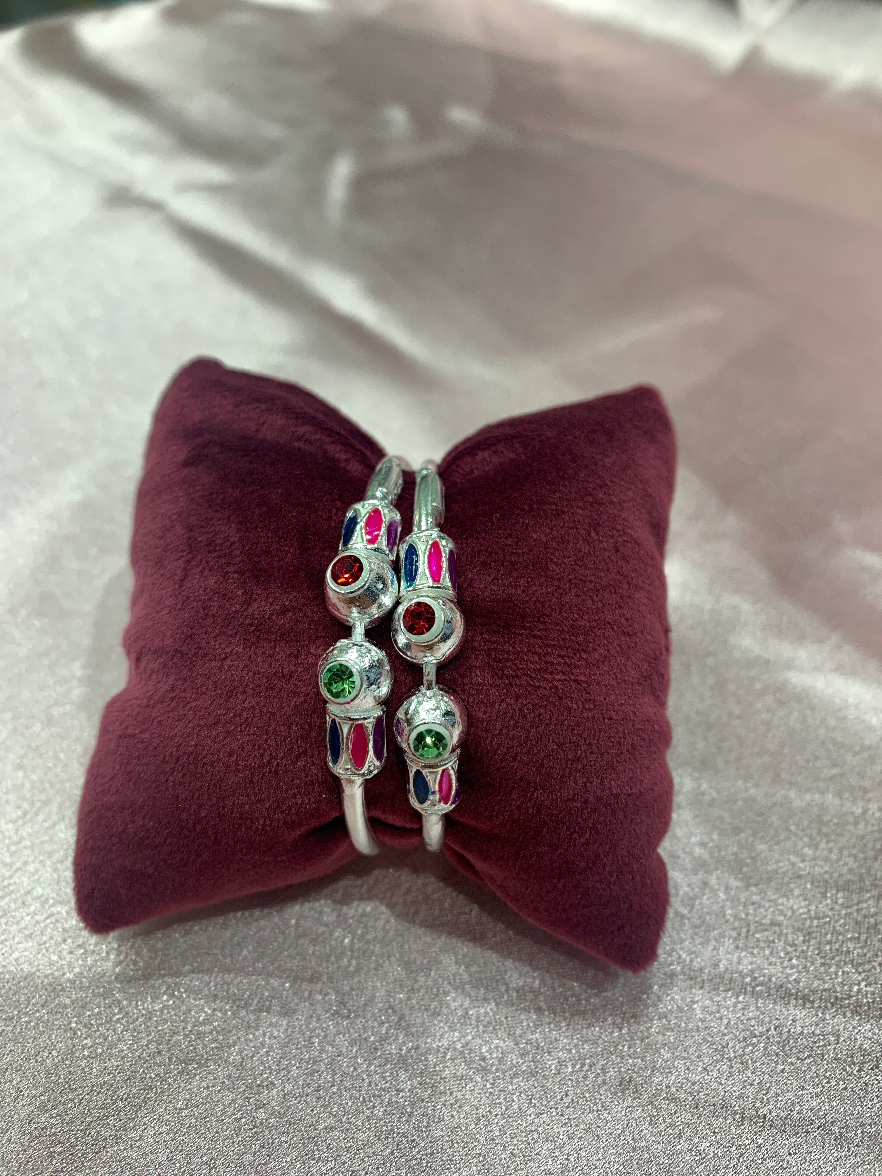 Silver baby bangles with red and green CZ diamonds