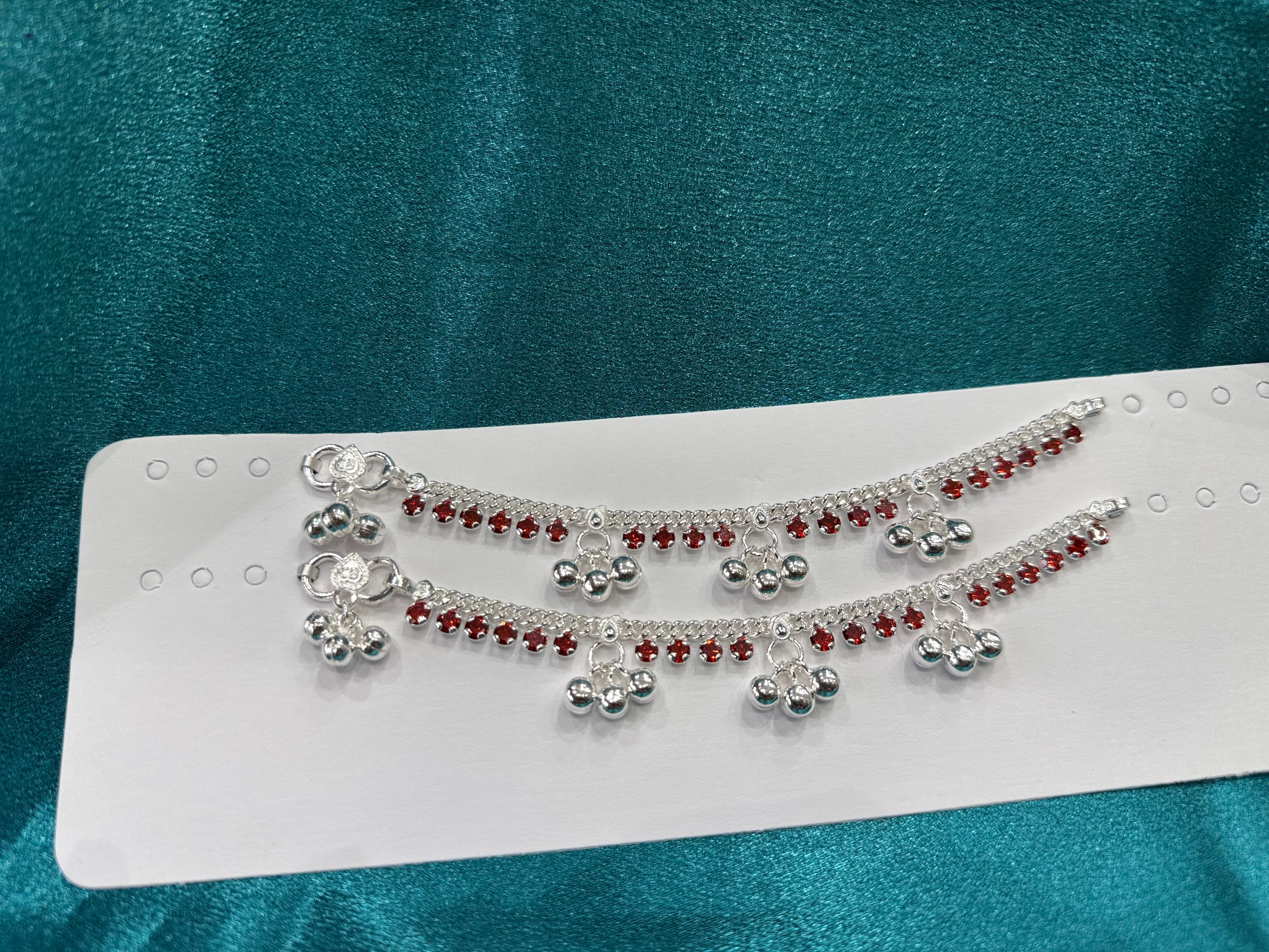 Kids fancy silver anklets with row of red stones and bells (Size 2-3 year old)