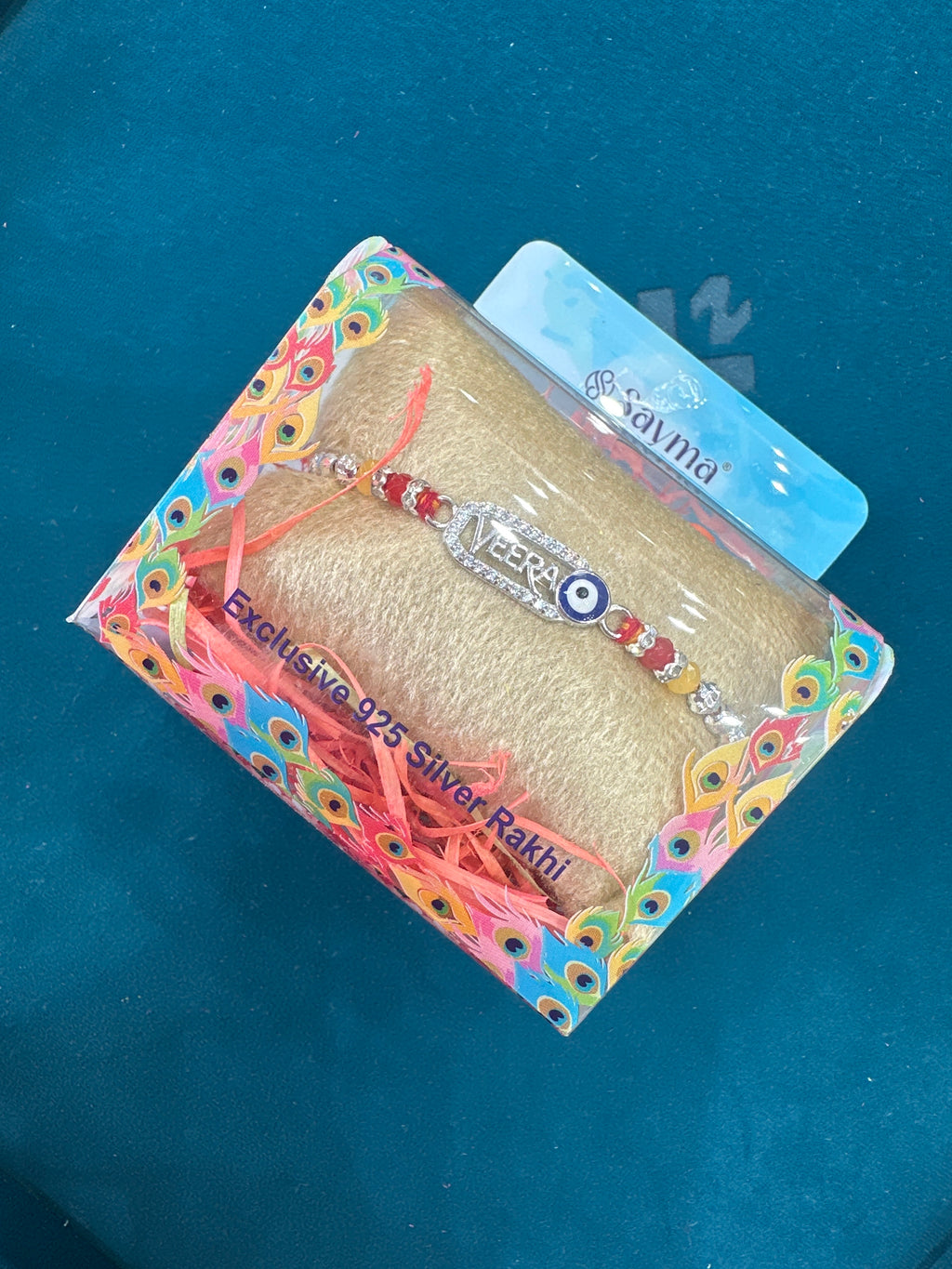 Silver Fancy Rakhi