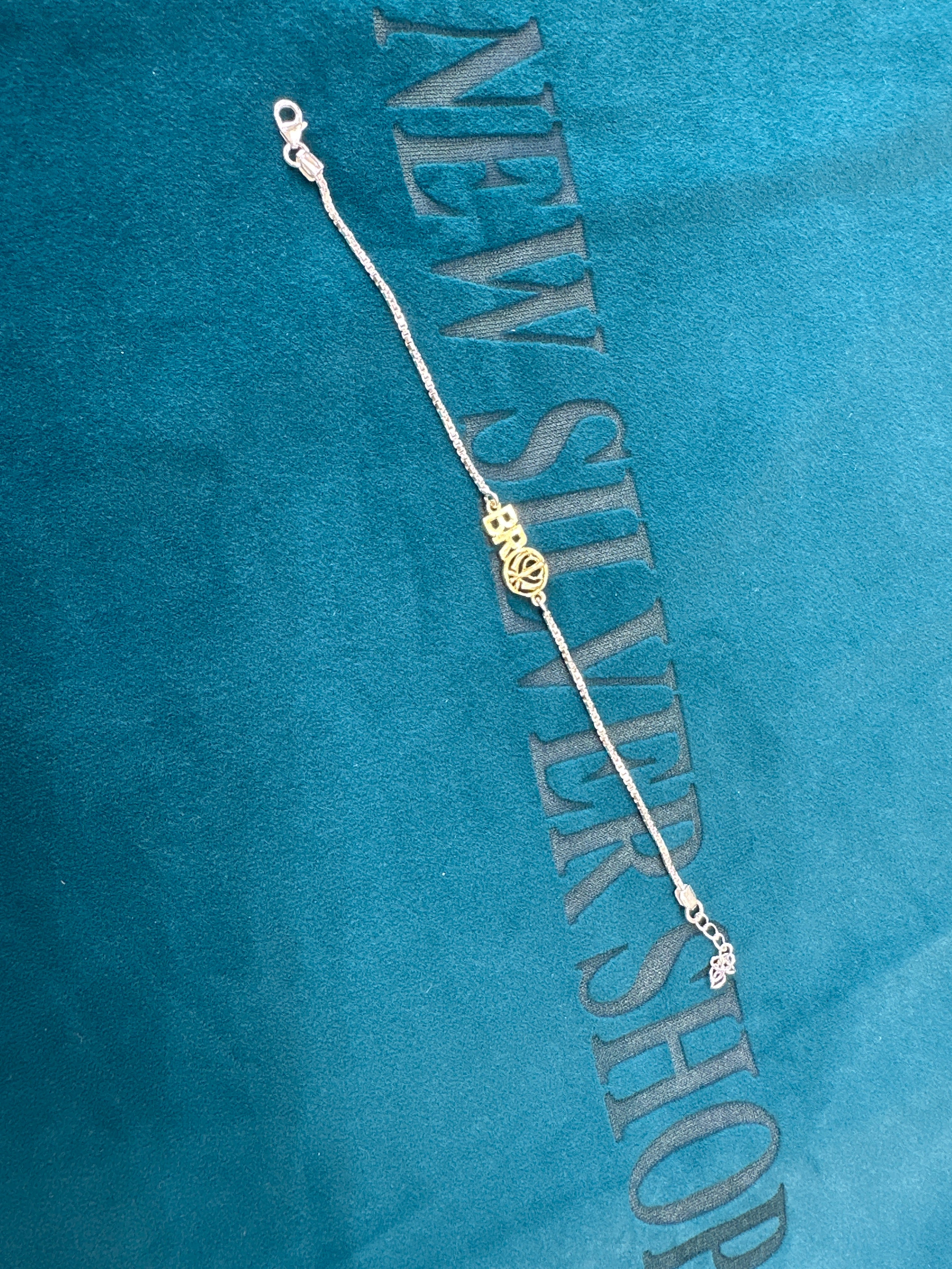 Silver Fancy Rakhi