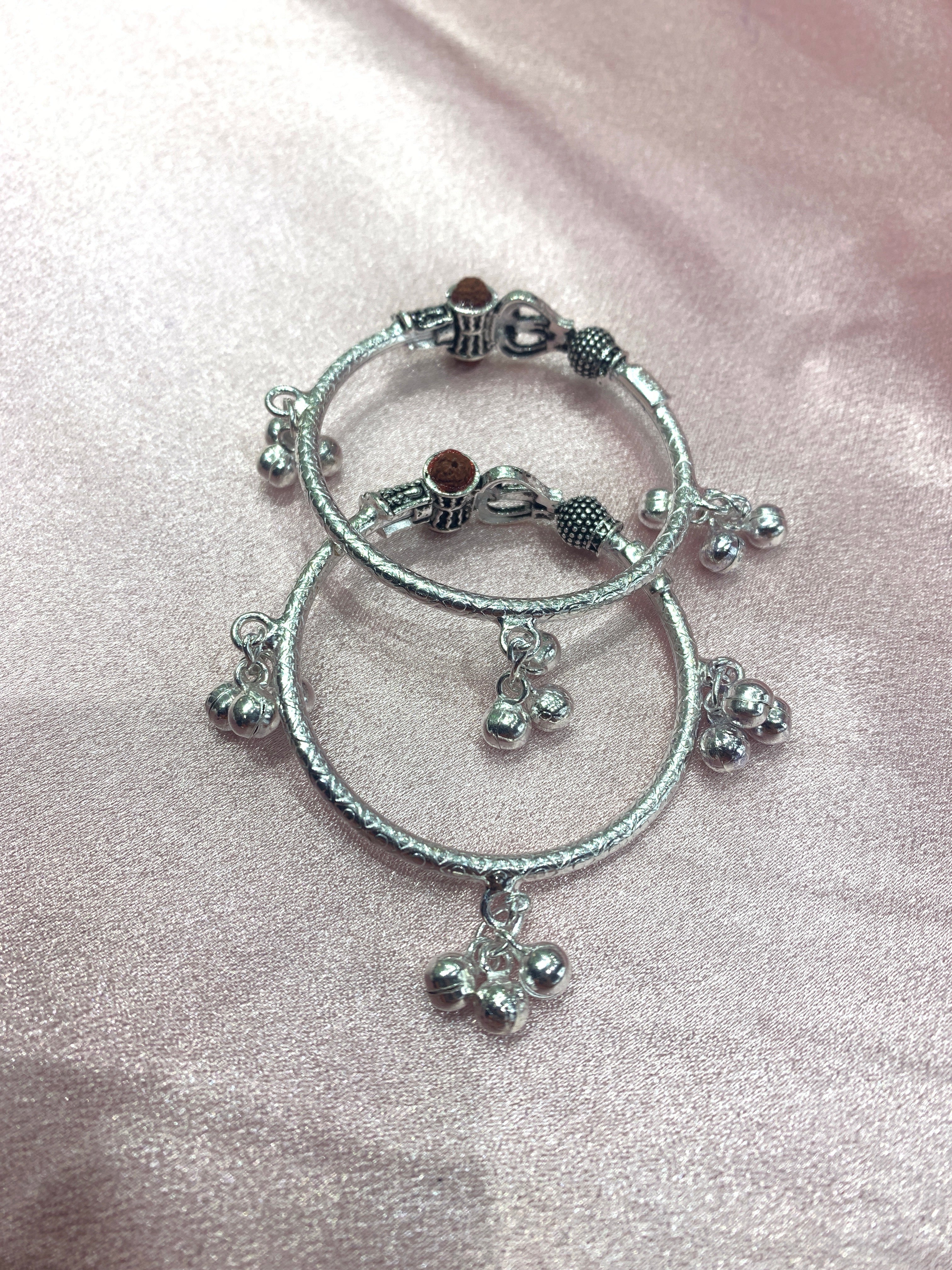 Silver baby kada with trishul and rudraksh