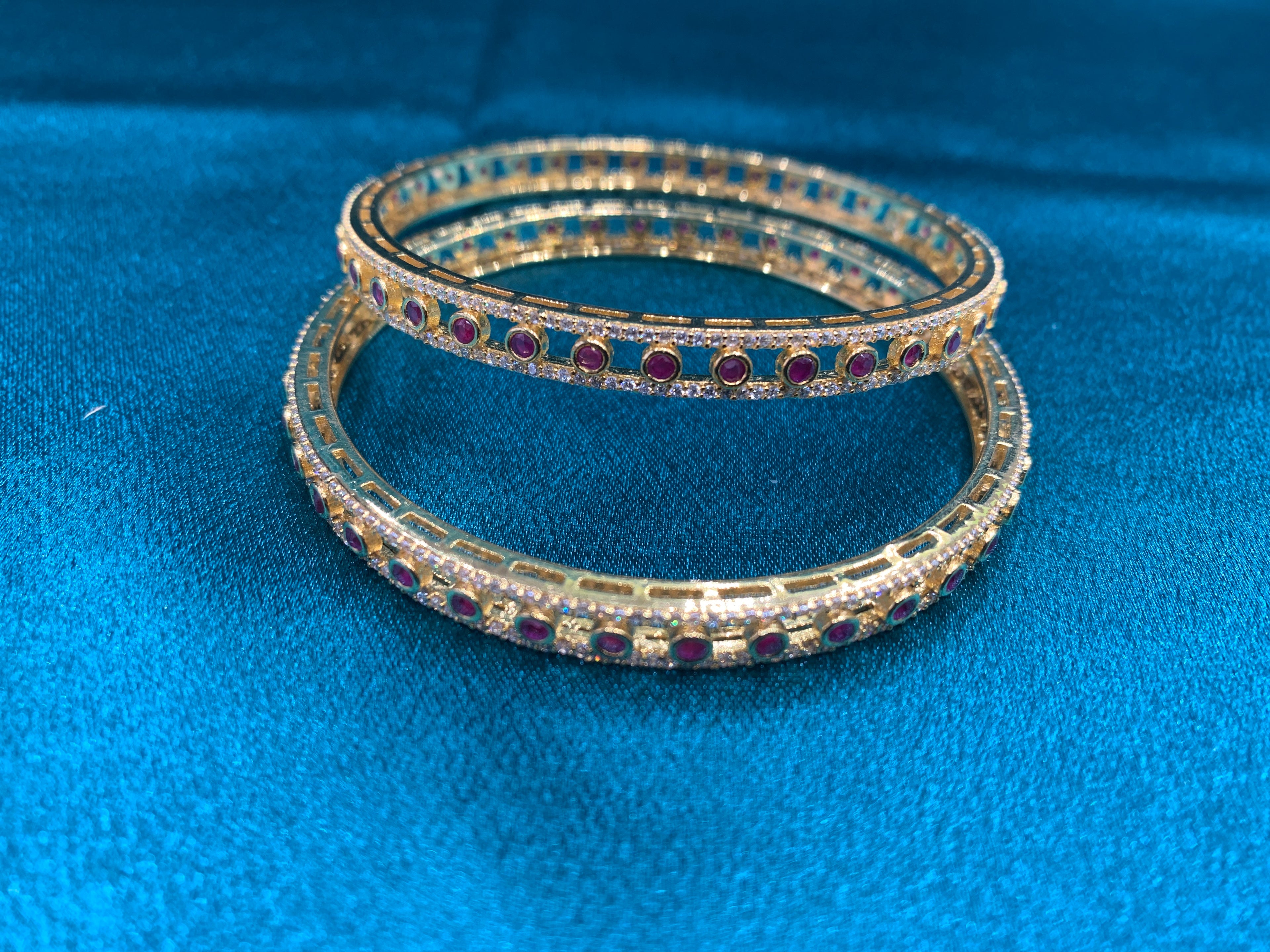 Dazzling gold plated silver bangles with pink CZ diamonds