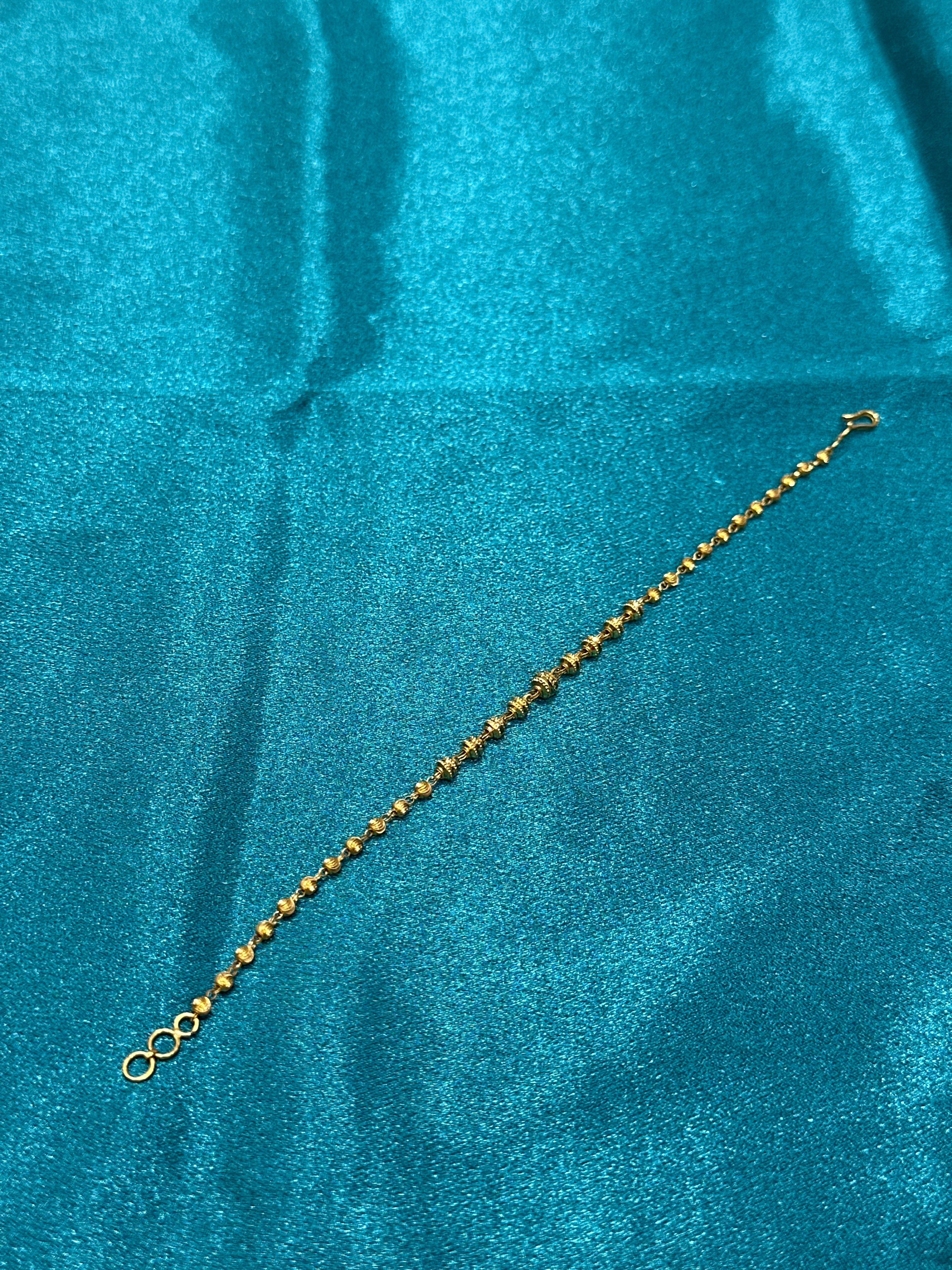 22K Gold Bracelet With Bead Design & Thicker Beads In The Centre