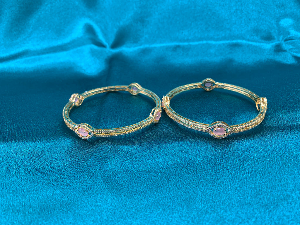 Dazzling gold plated silver bangles with peach oval cutting CZ diamonds