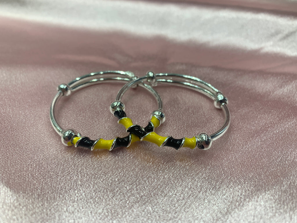 Silver baby bangles in black and yellow colour