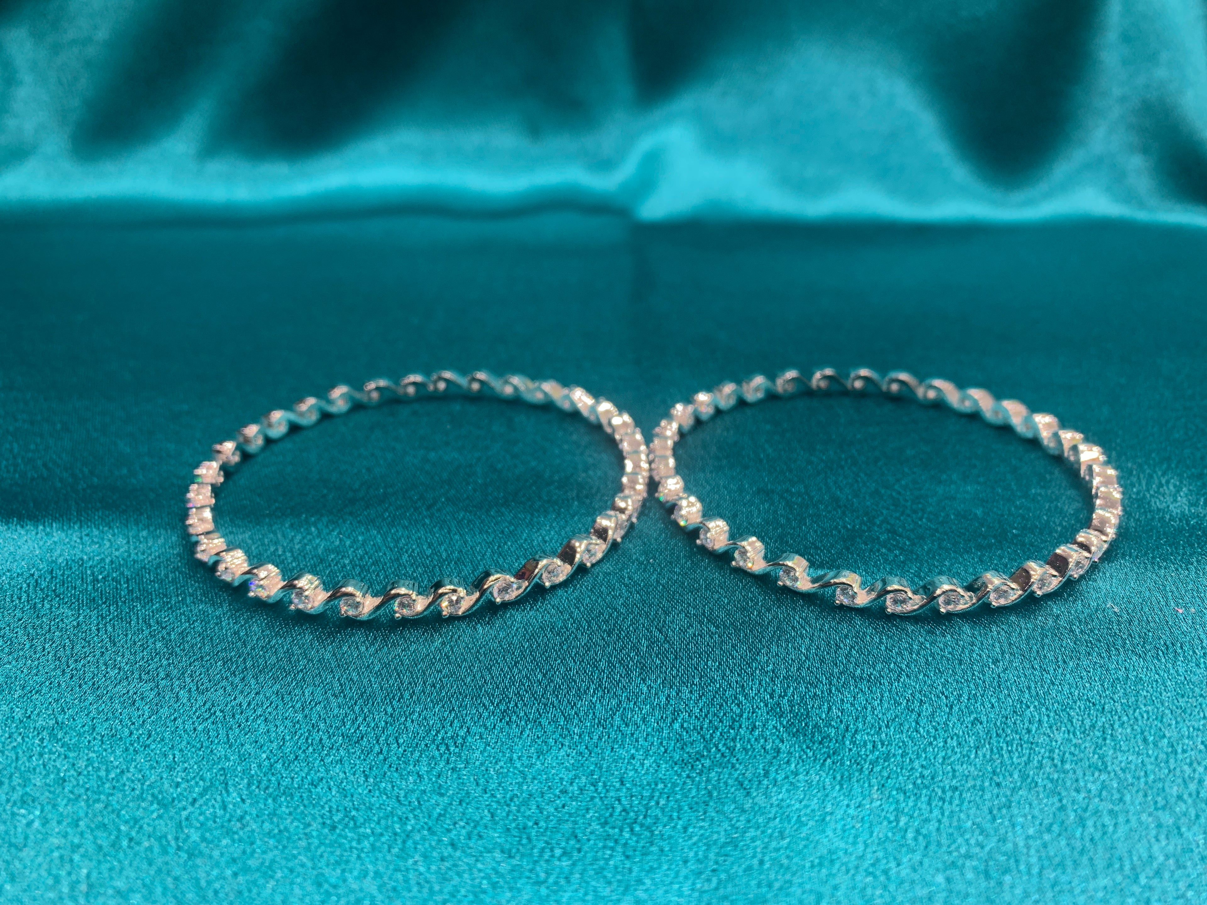Elegant CZ diamond silver bangles with white CZ diamonds in zig zag design