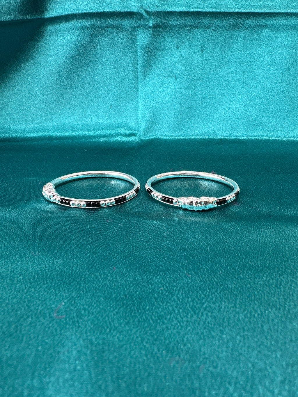 Silver baby bangles with black beads