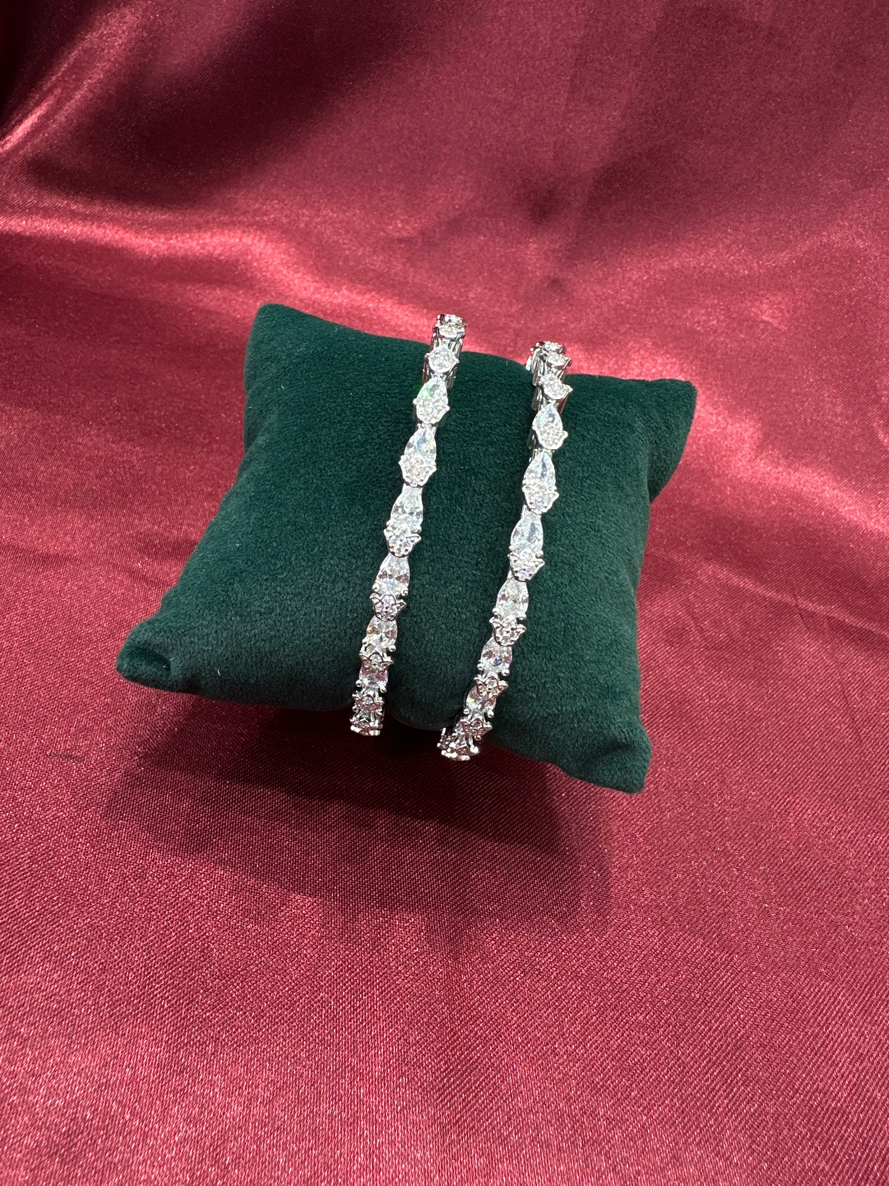 Elegant CZ diamond silver bangles with white stone in sequence design