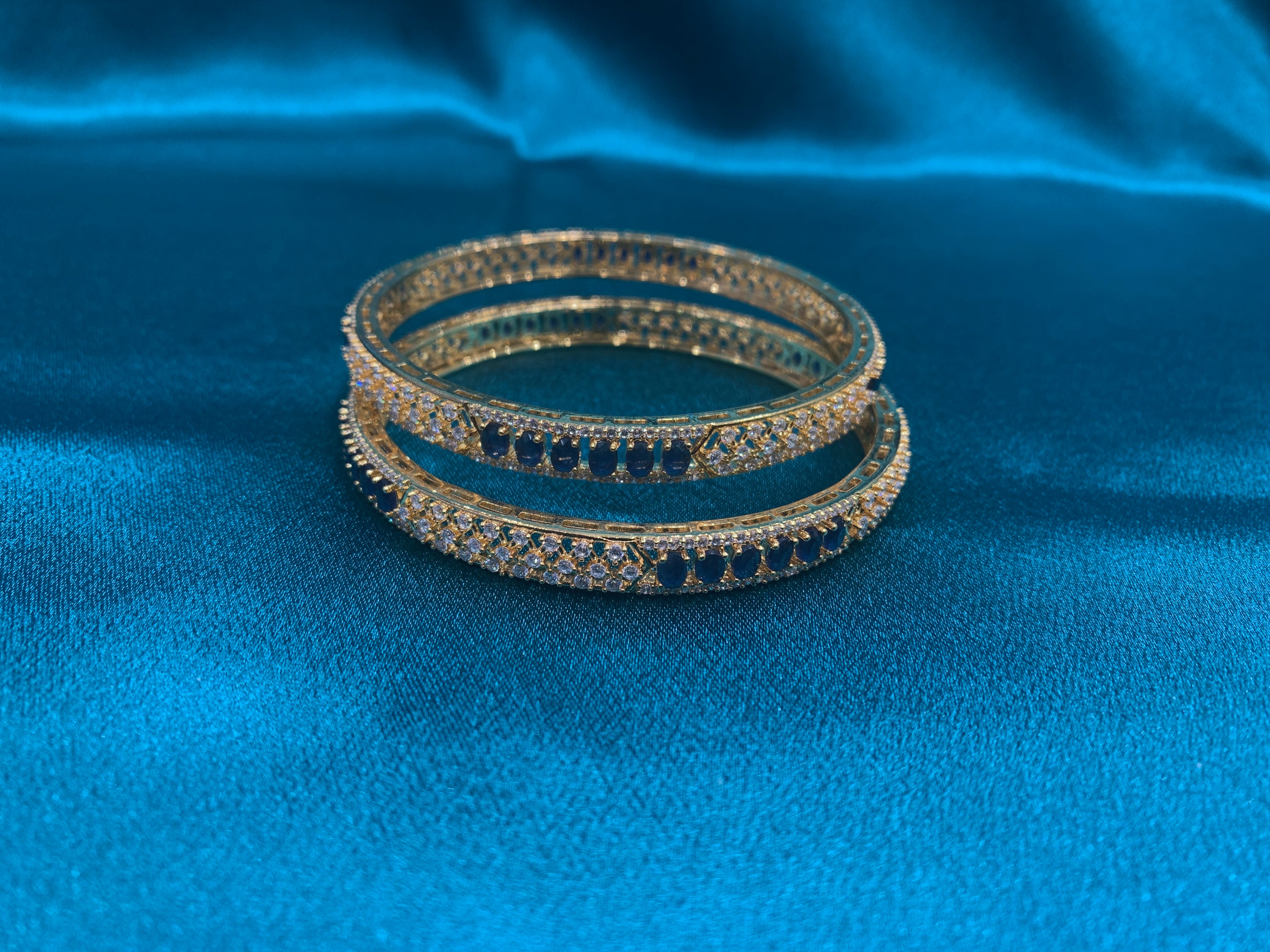 Dazzling Gold plated silver bangles with blue stones and CZ diamonds