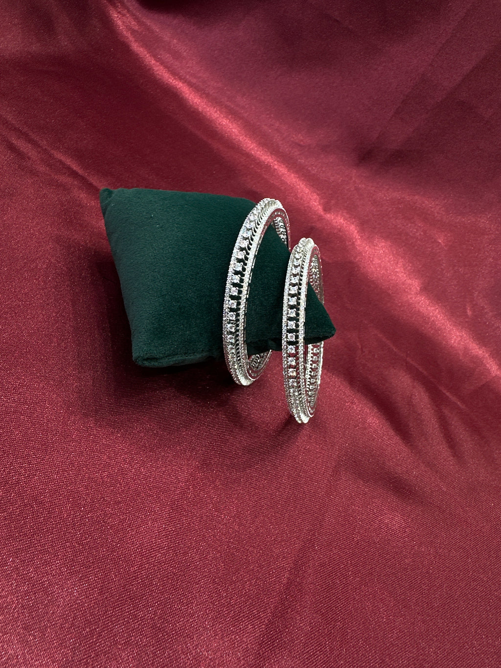 Elegant CZ diamond silver bangles with white stone in sequence design