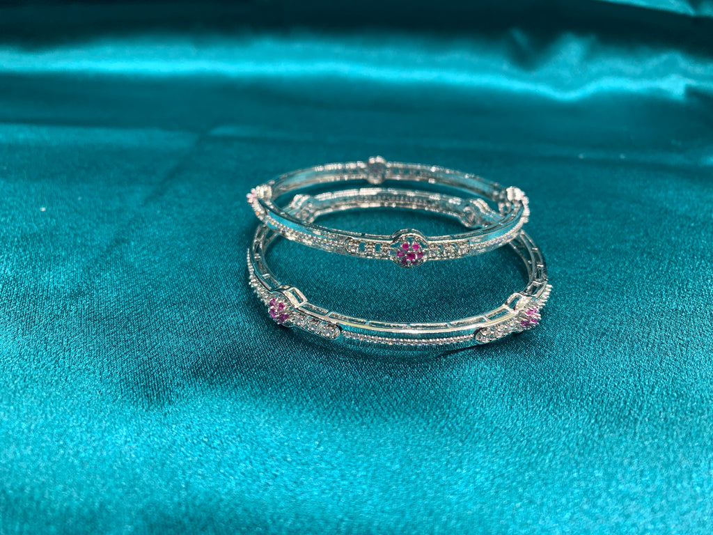 Elegant CZ diamond silver bangles with pink stones in flower pattern