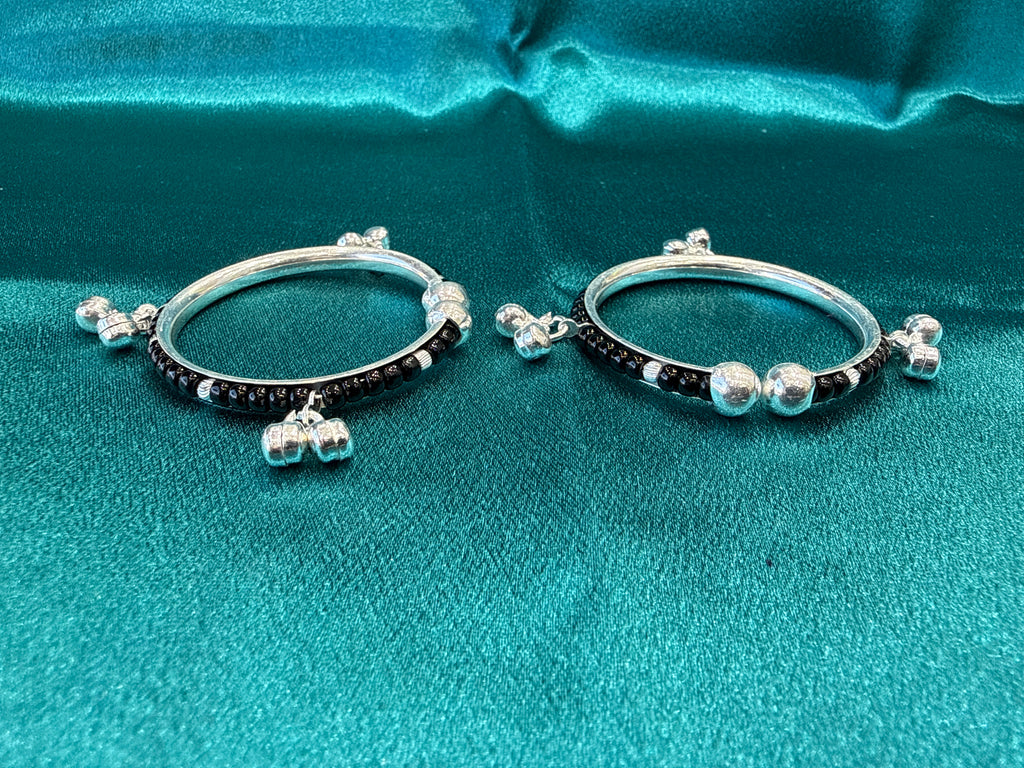 Silver baby bangles with black beads and bells BBB6