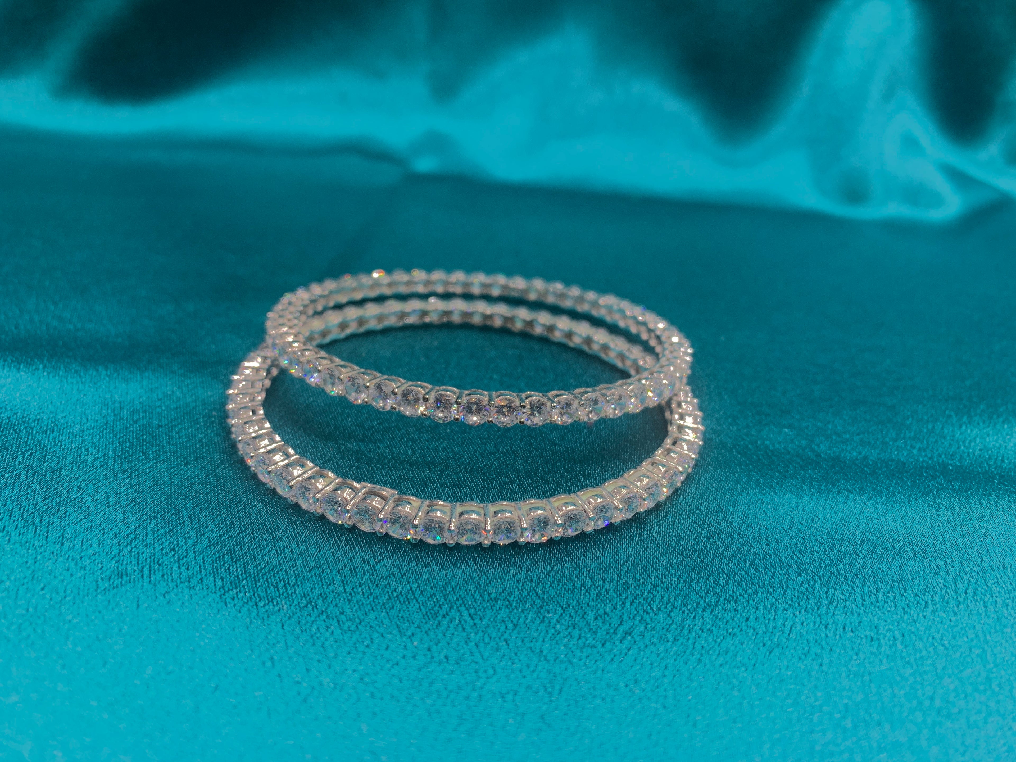 Elegant CZ diamond silver bangles with white stone in sequence design