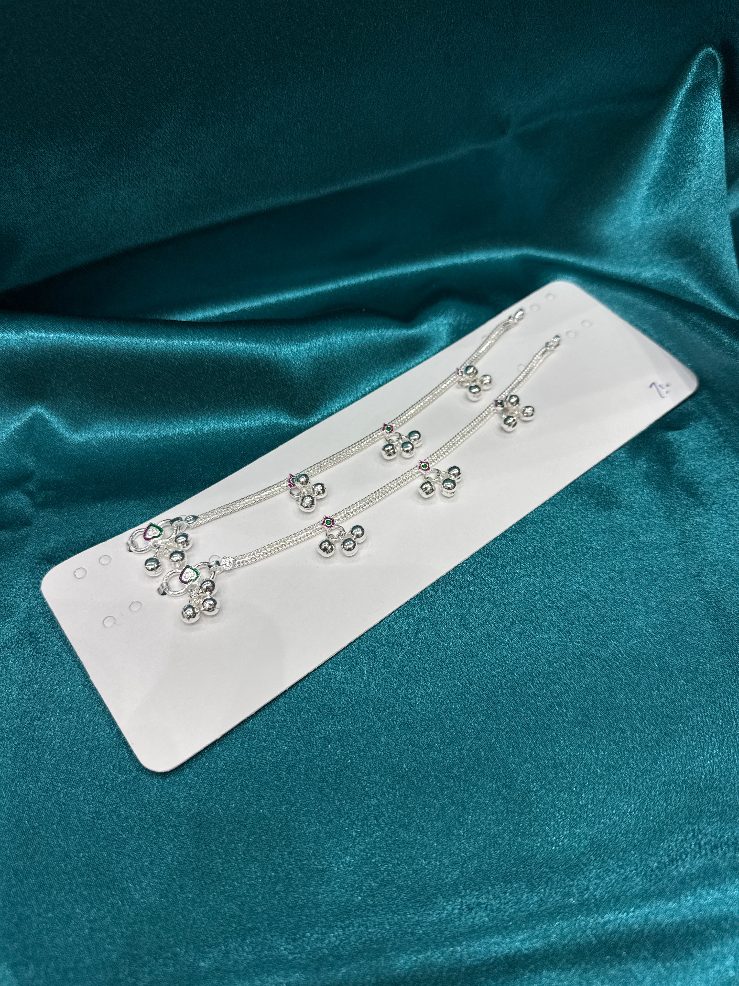 Kids fancy silver anklet with purple and green Meena and hanging bells (Size: 6-9 year old)