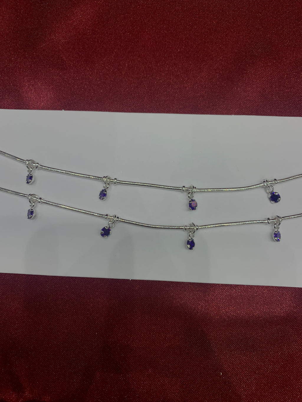 Fancy silver anklets with purple hanging CZ diamonds