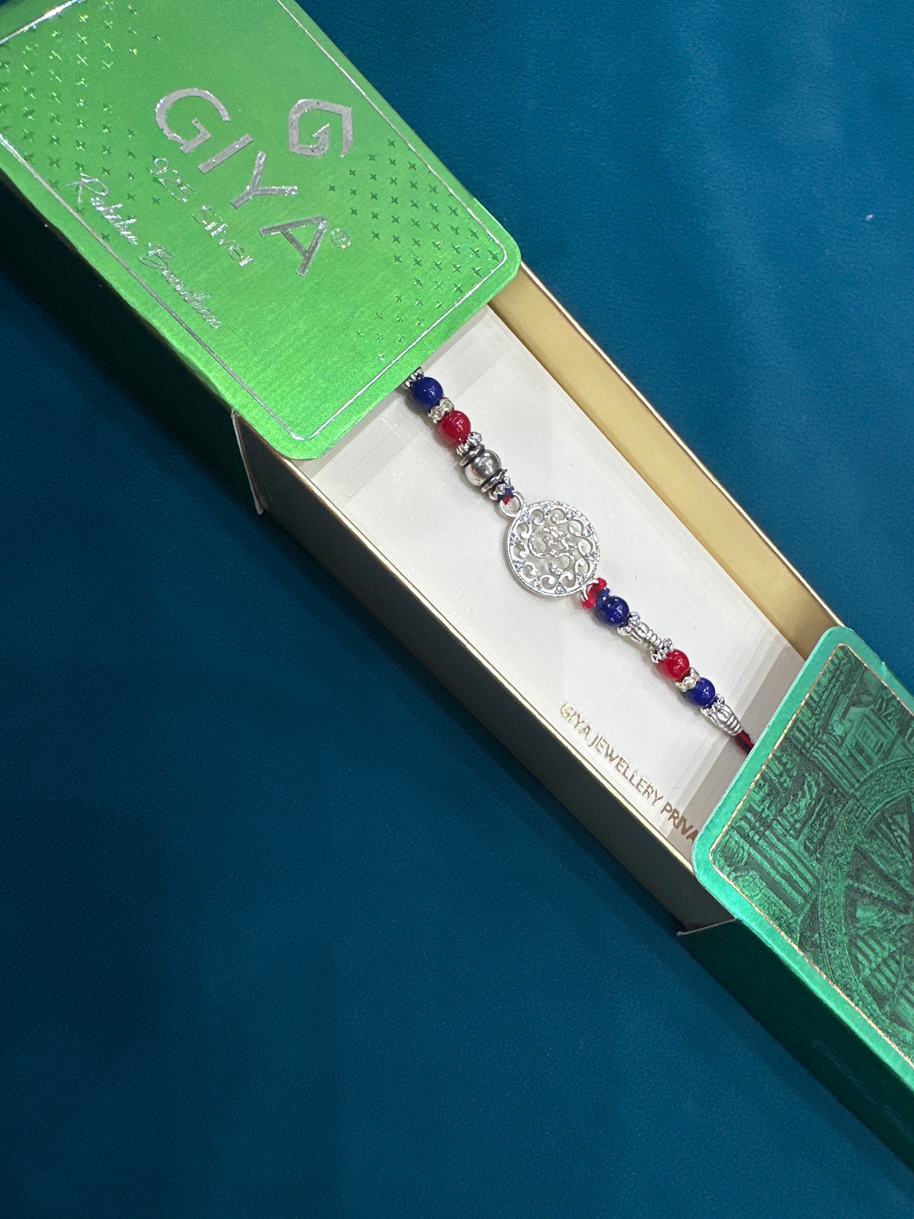 Silver Fancy Rakhi