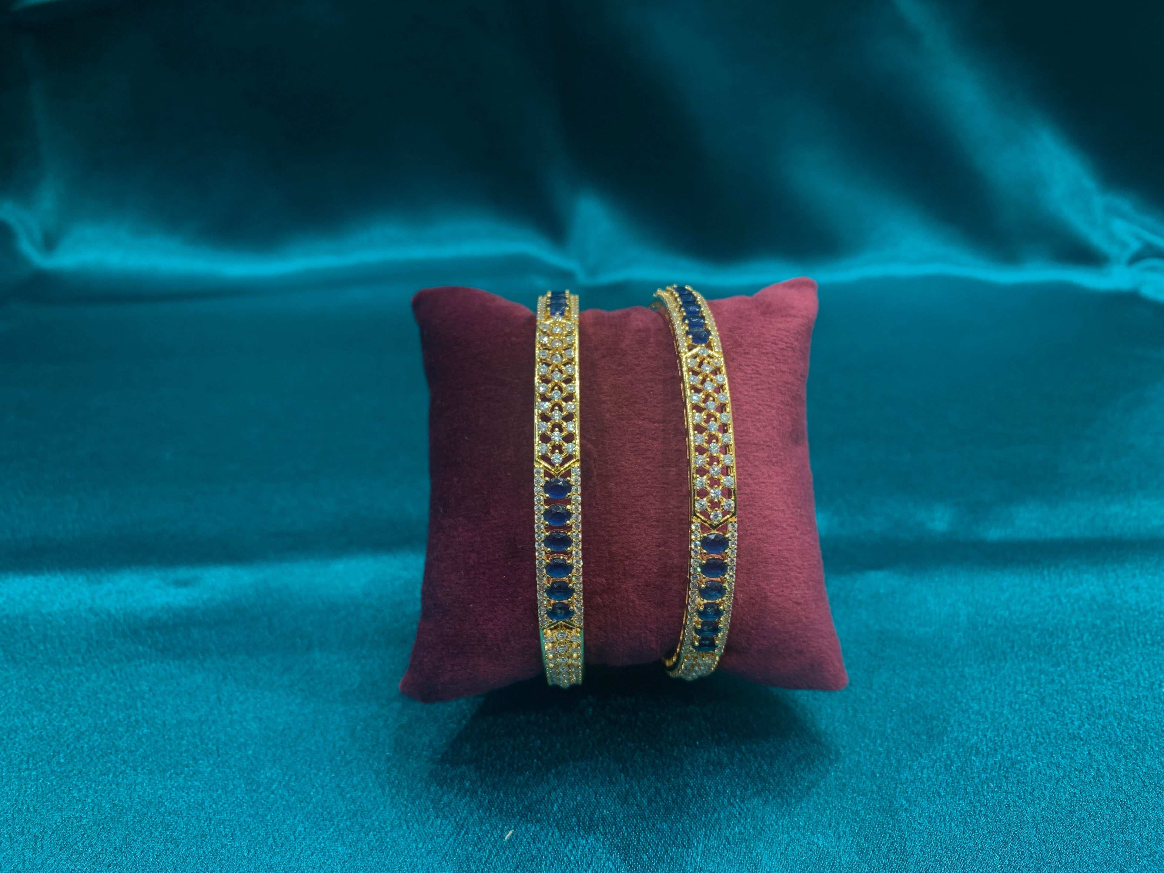 Dazzling Gold plated silver bangles with blue stones and CZ diamonds