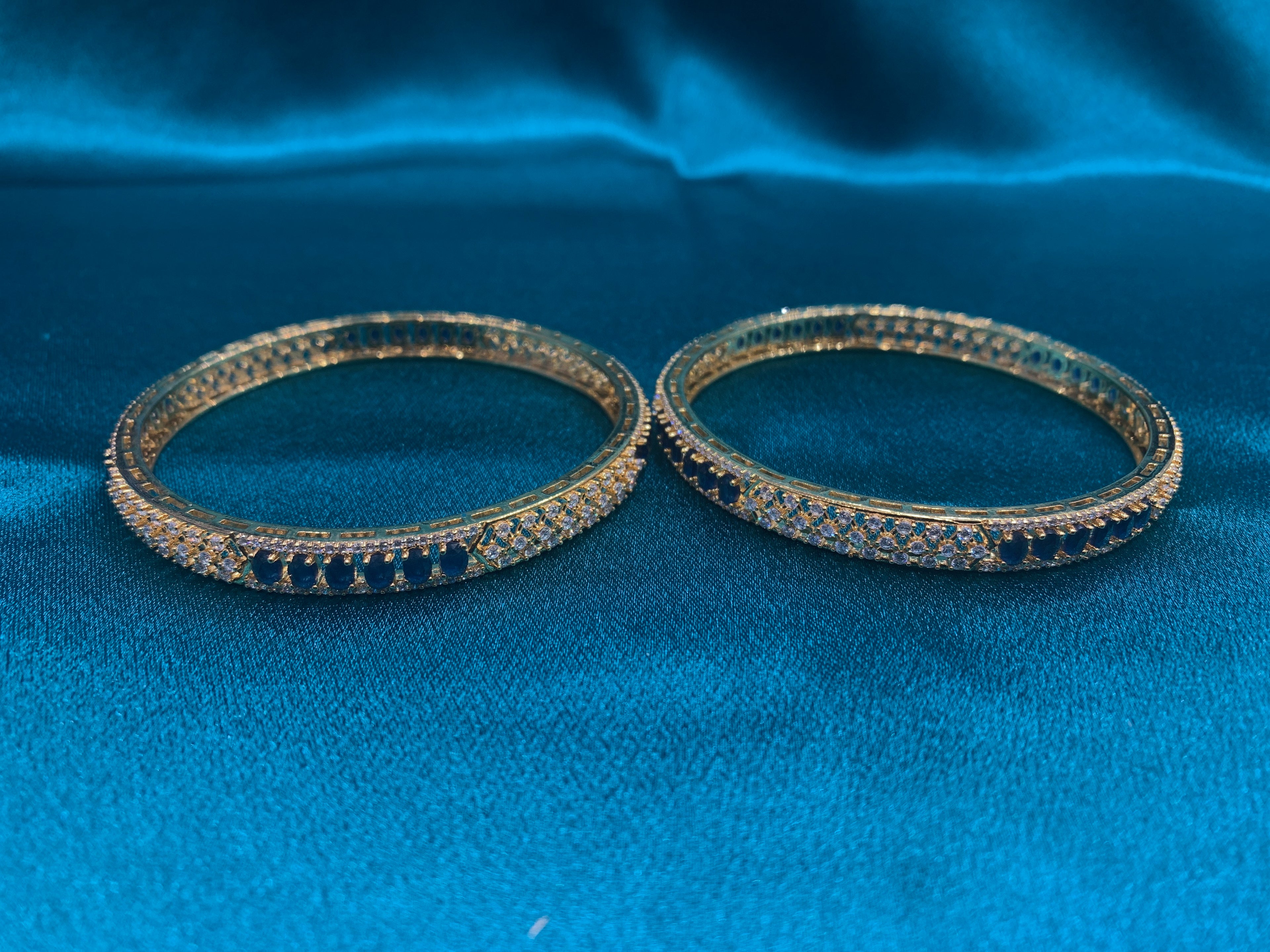 Dazzling Gold plated silver bangles with blue stones and CZ diamonds