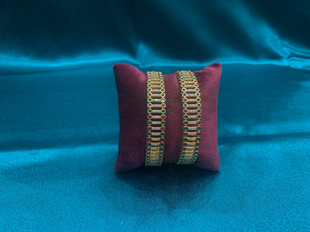 Dazzling gold plated silver bangles with green and pink CZ diamonds