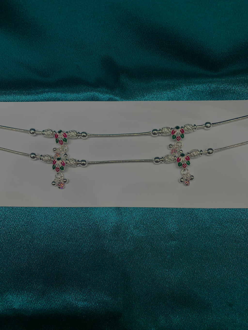 Fancy silver anklets with flower petals design