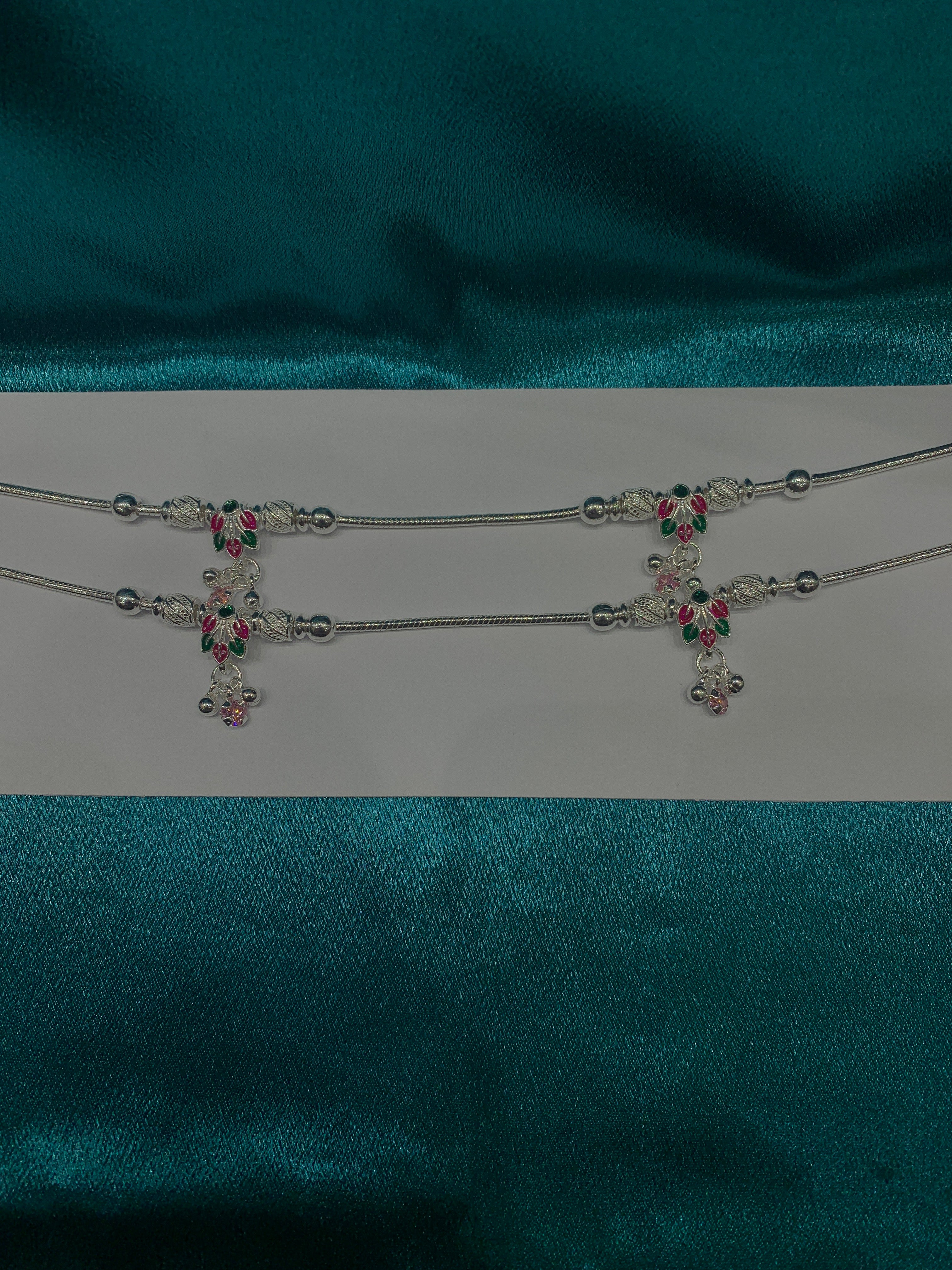 Fancy silver anklets with flower petals design