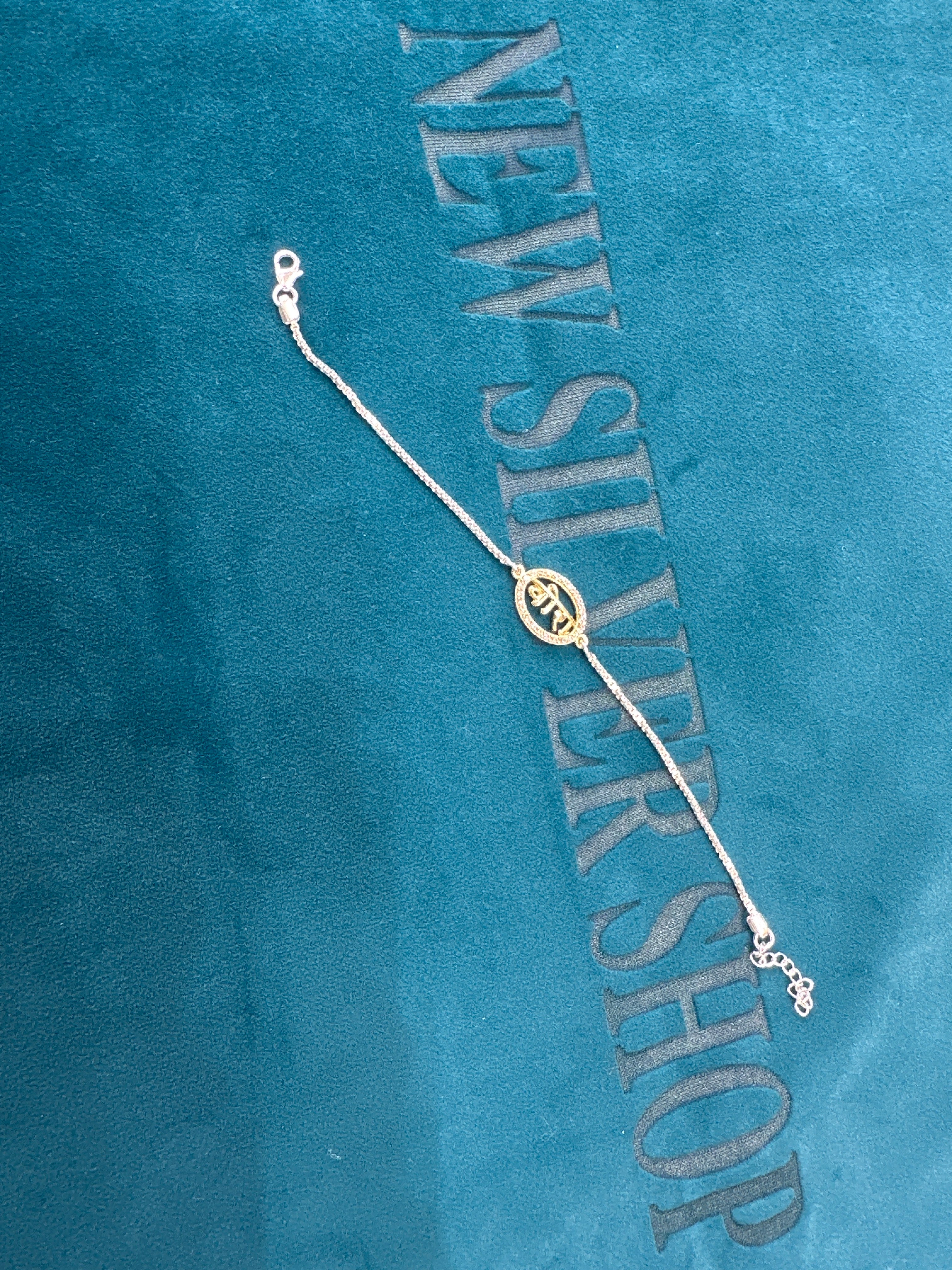 Silver Fancy Rakhi
