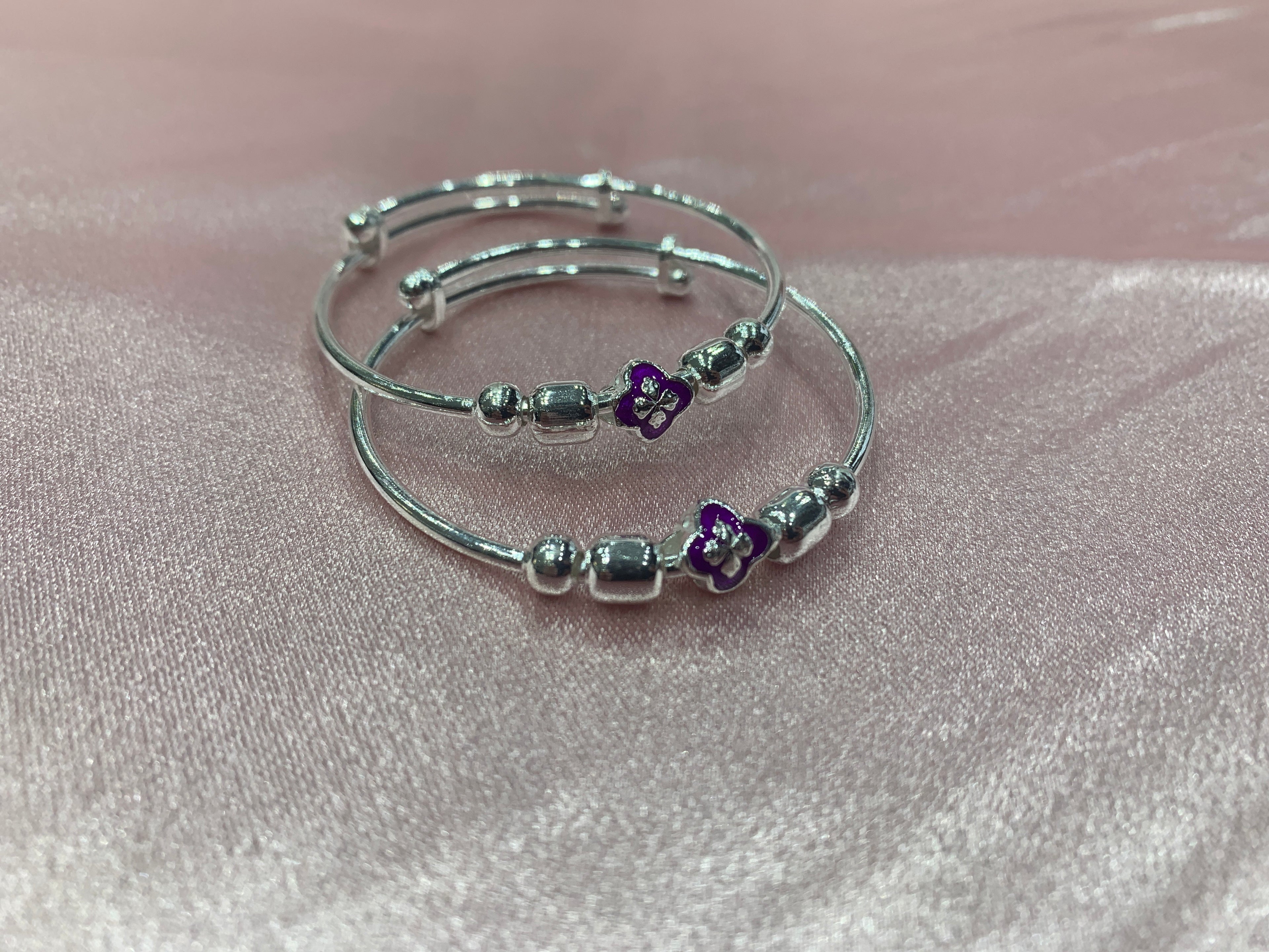 Silver baby bangles with purple flower beads