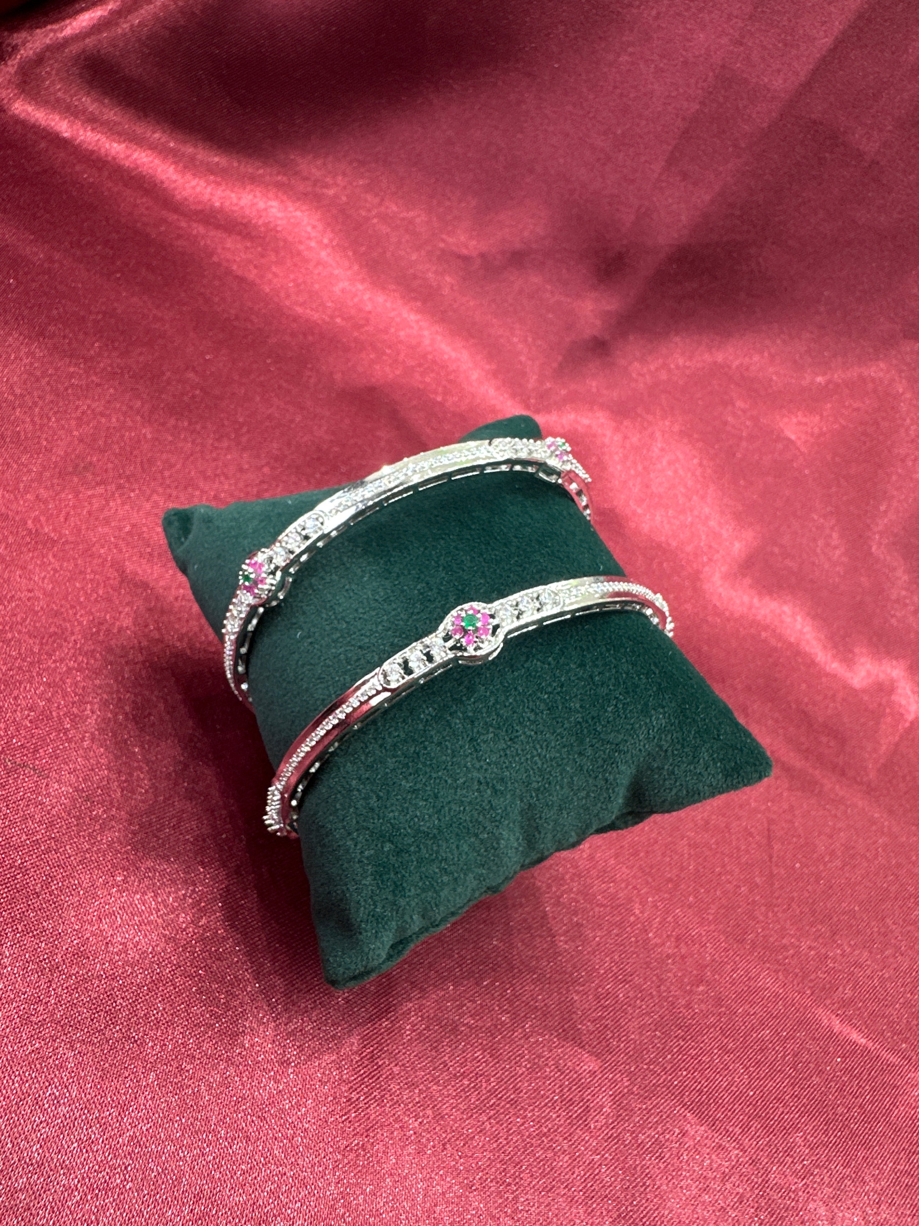 Elegant CZ diamond silver bangles with white stone in sequence design