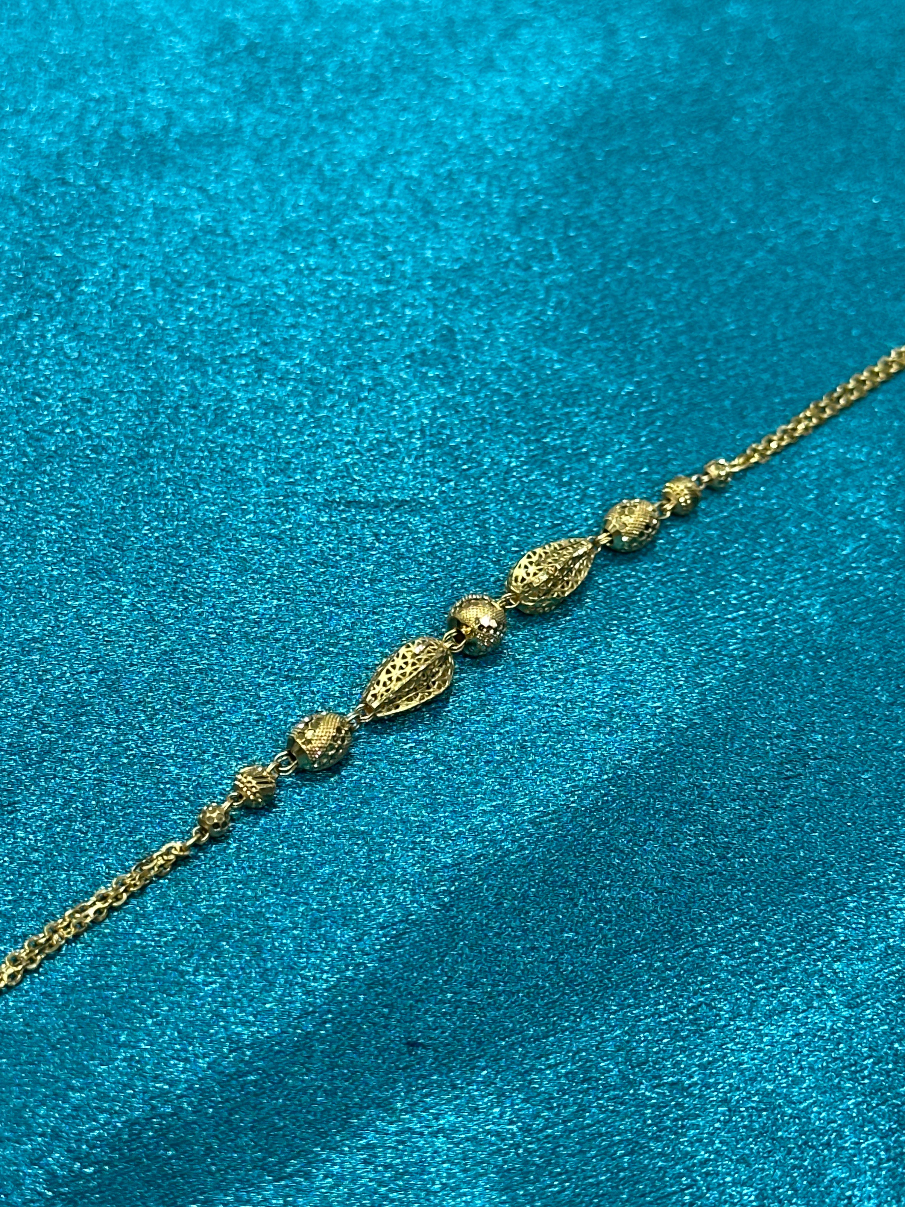 22K Gold Bracelet With Double chain & Fancy Beading Design In Centre