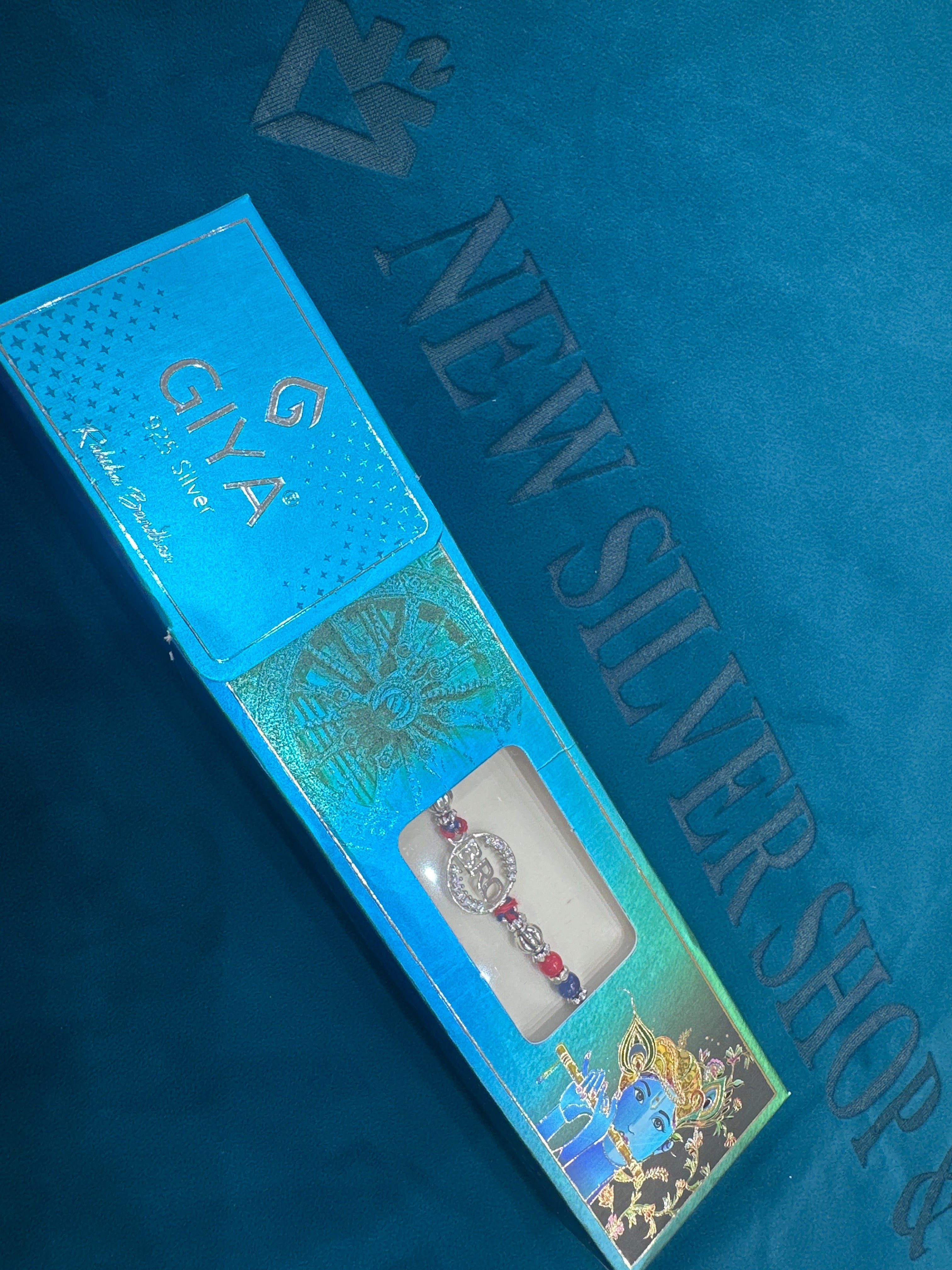 Silver Fancy Rakhi