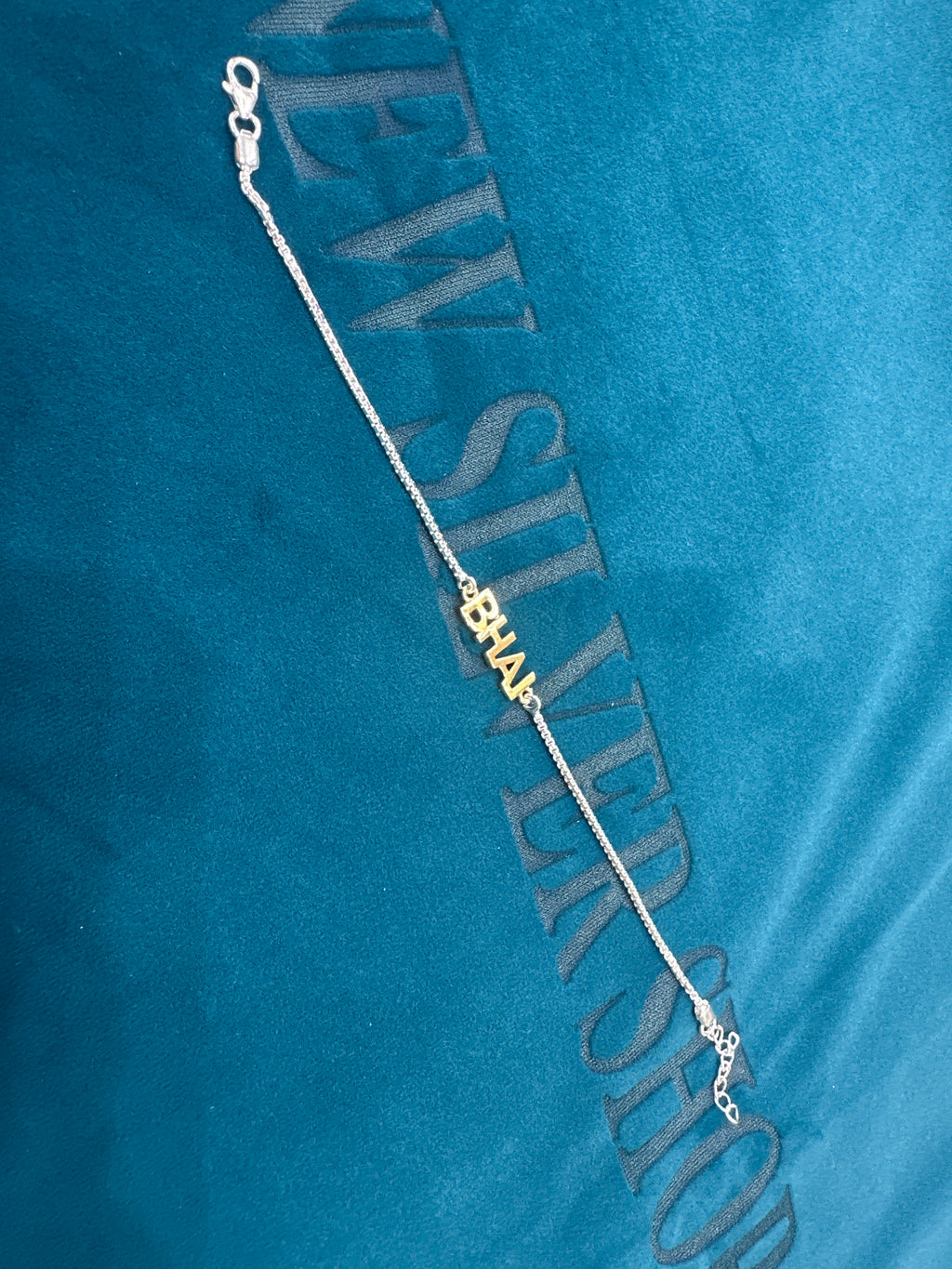 Silver Fancy Rakhi
