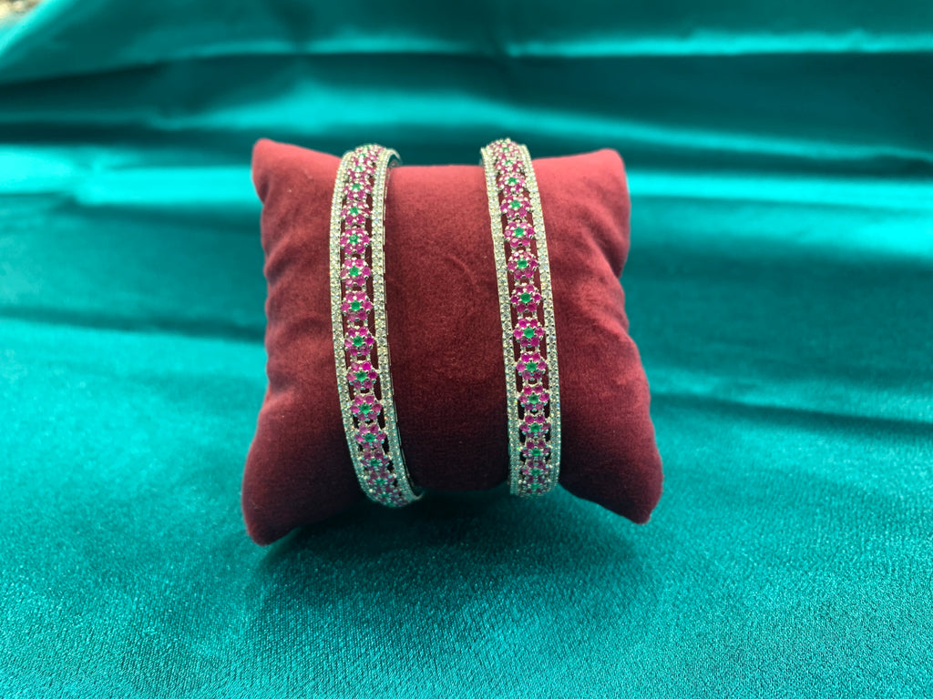 Elegant CZ diamond bangles with green and pink CZ diamonds