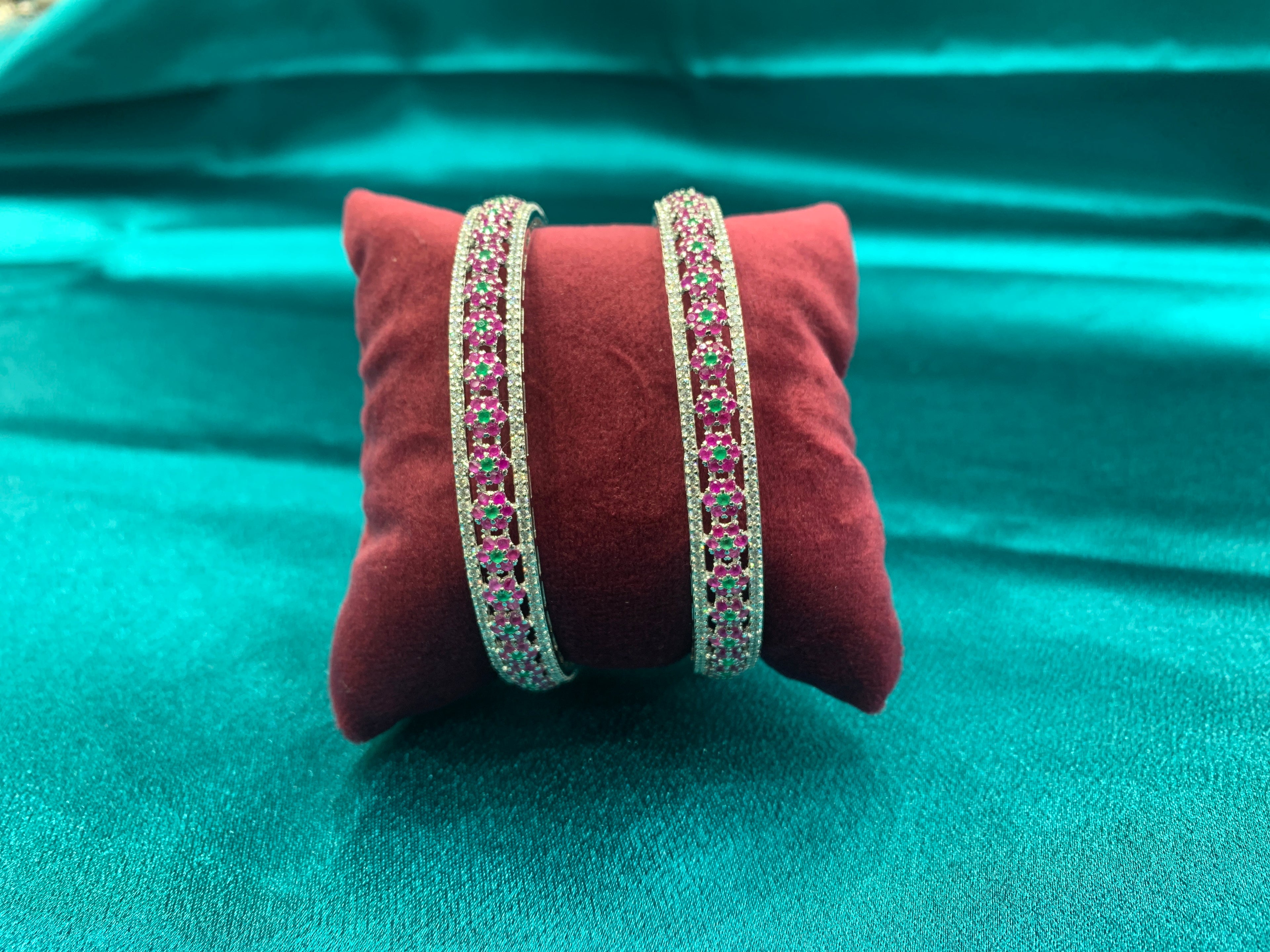 Elegant CZ diamond bangles with green and pink CZ diamonds