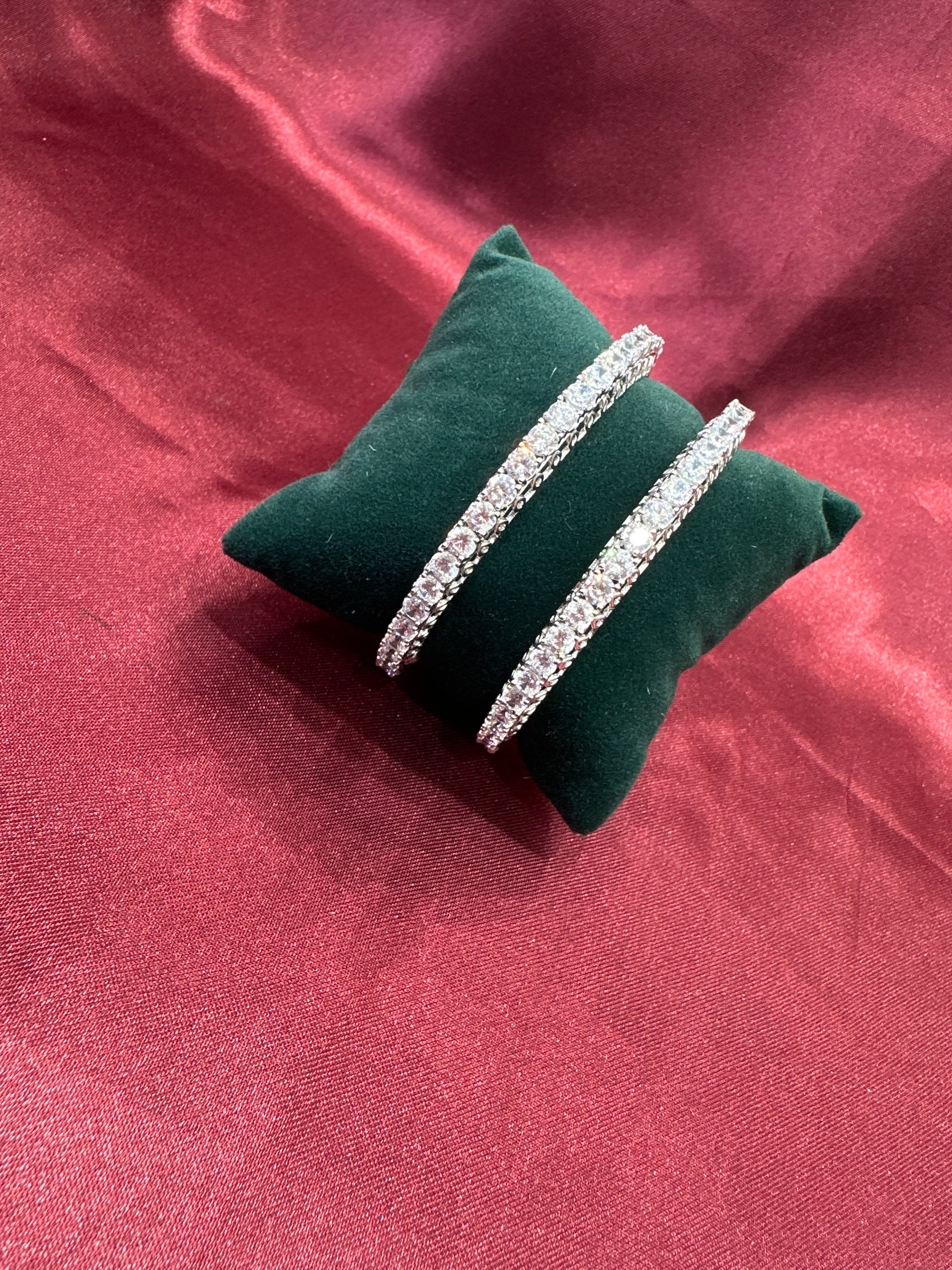 Elegant CZ diamond silver bangles with white stone in sequence design
