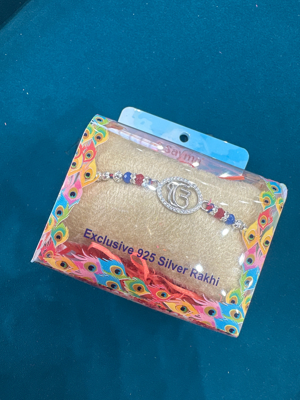 Silver Fancy Rakhi