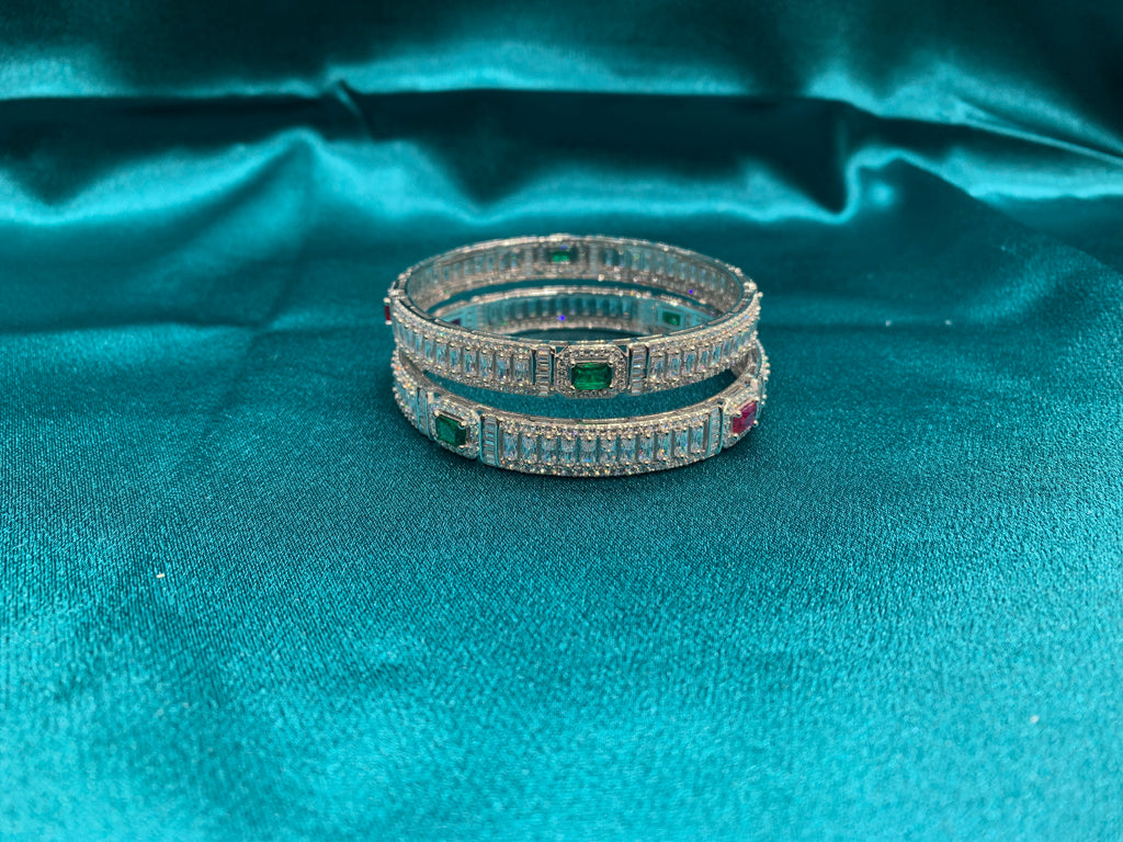 Elegant CZ diamond silver bangles with pink and green sqare cut stones