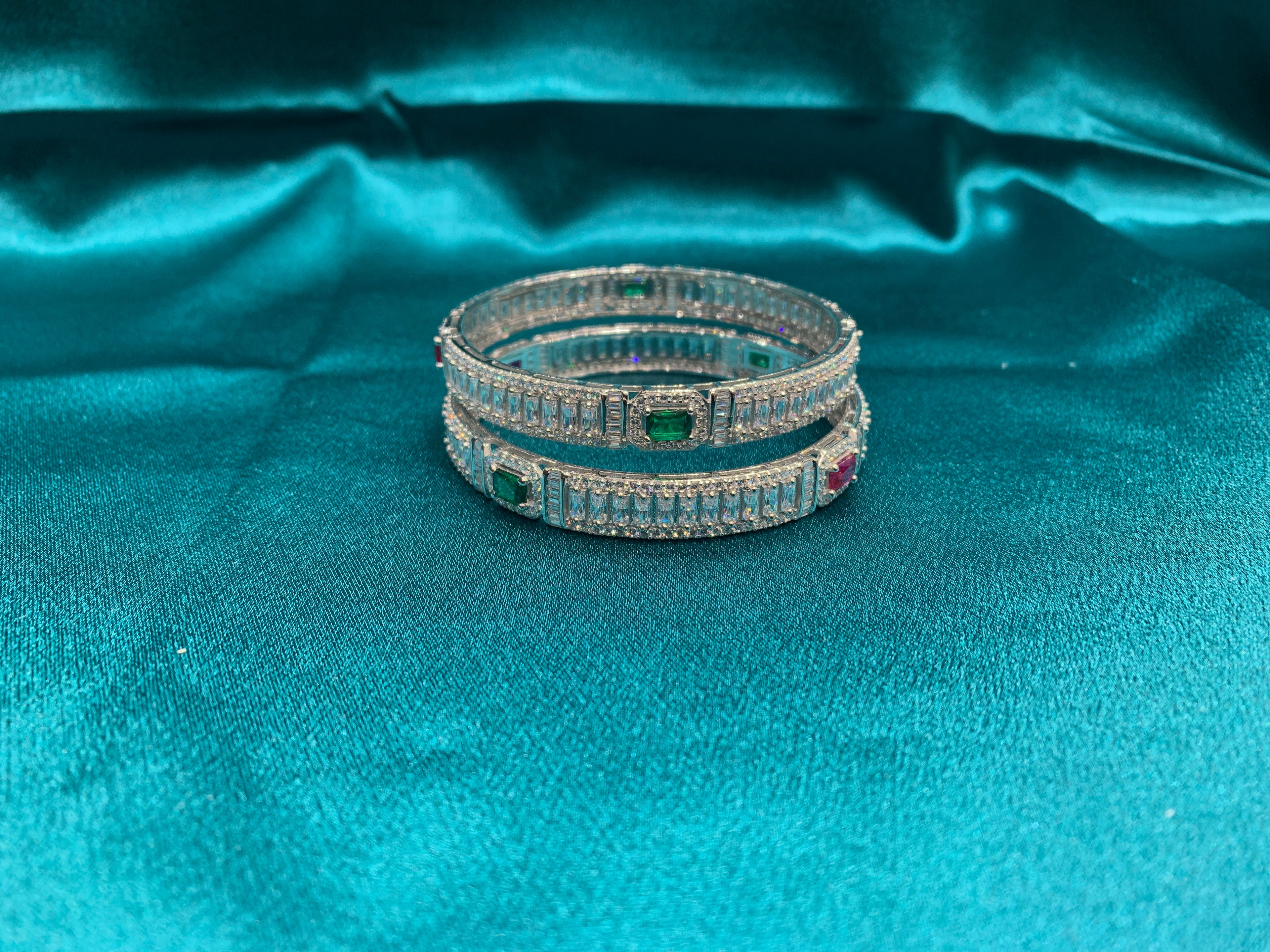 Elegant CZ diamond silver bangles with pink and green sqare cut stones